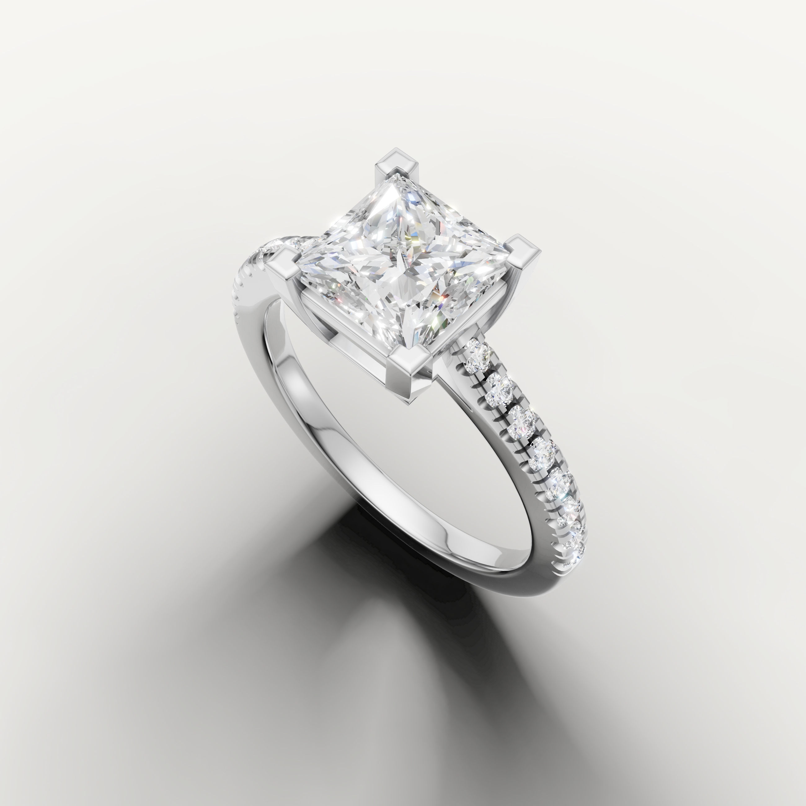Raul Diamonds luxury white gold engagement ring with princess cut center diamond