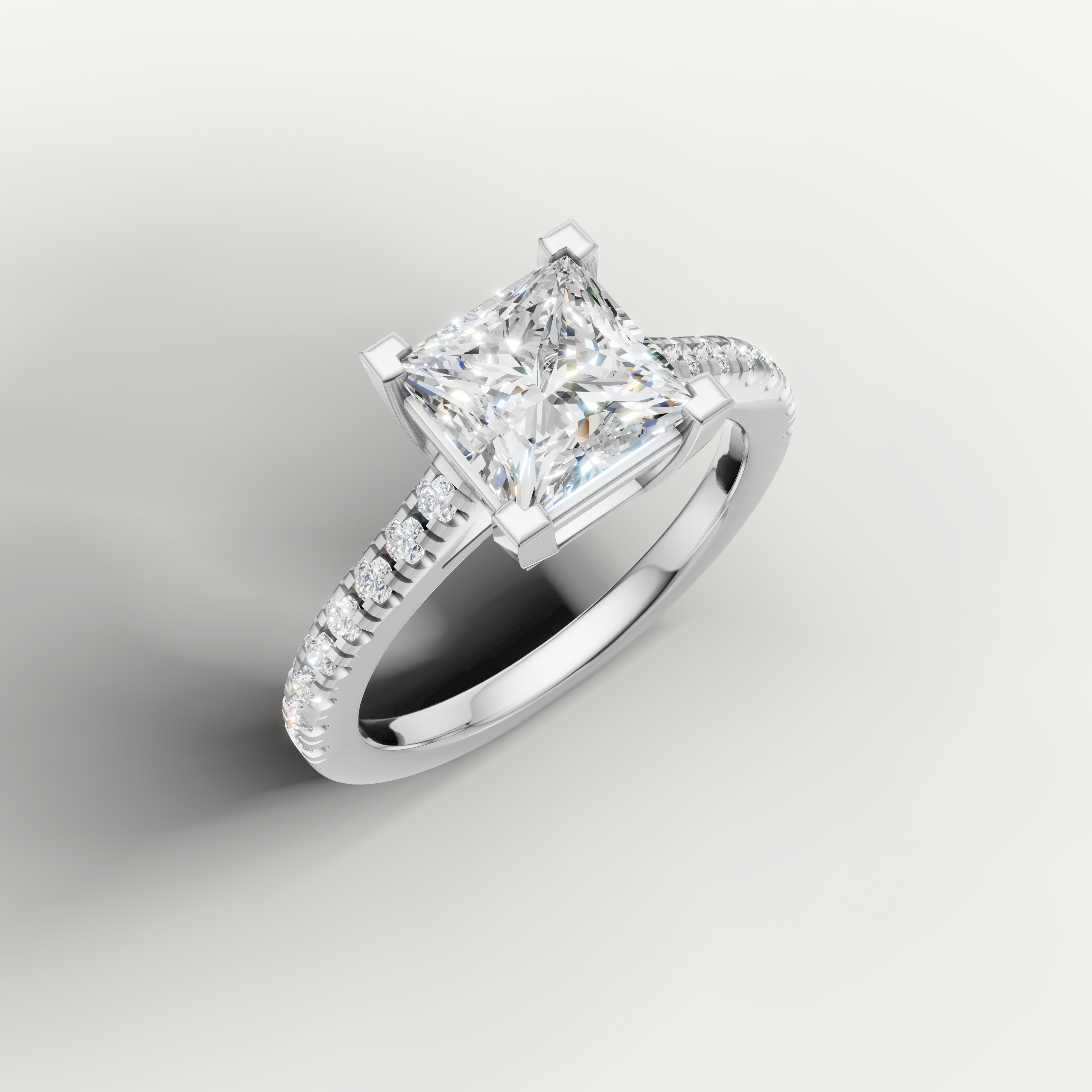White gold princess cut solitaire engagement ring by Raul Diamonds with elegant sparkle