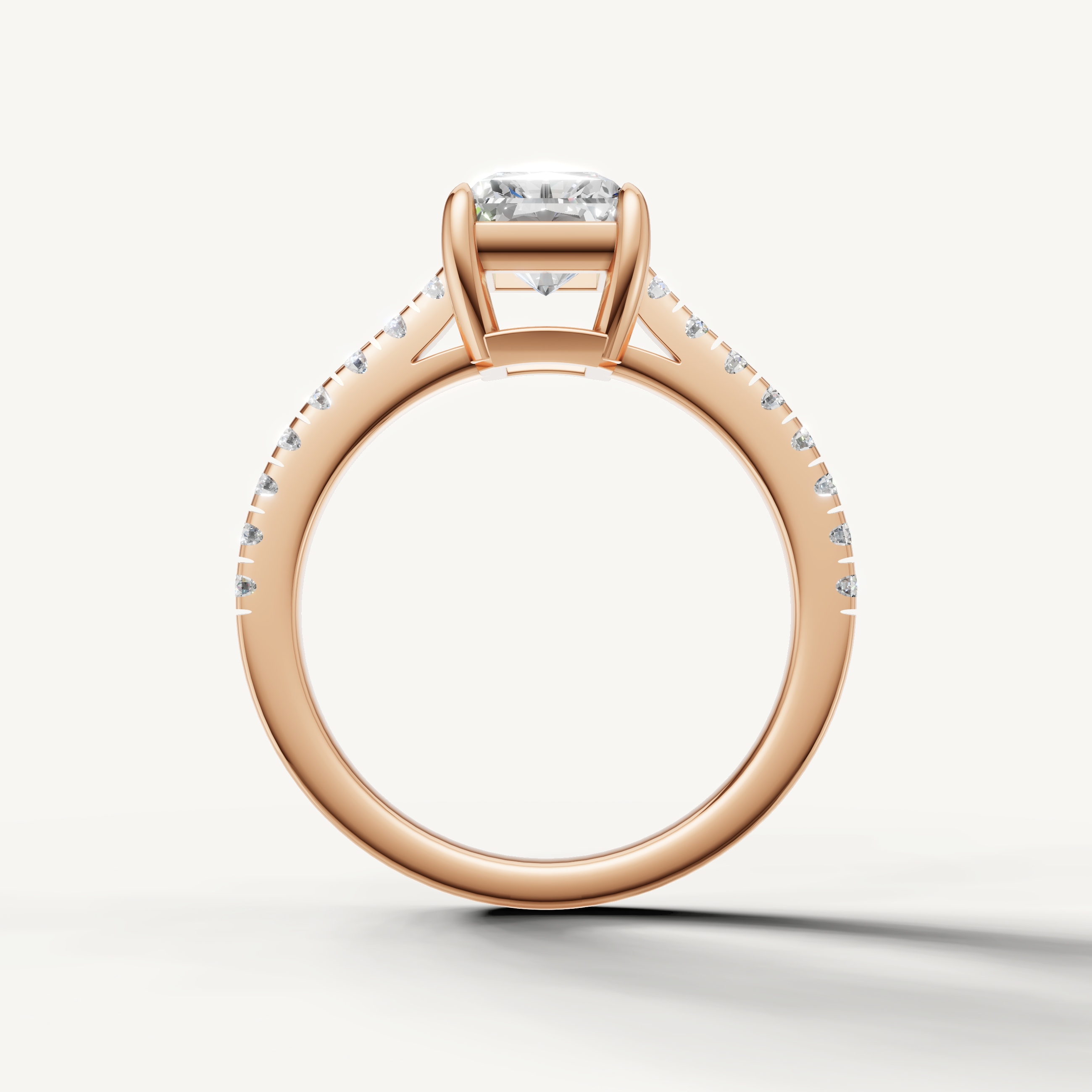 Radiant cut diamond ring in rose gold with thin pavé band