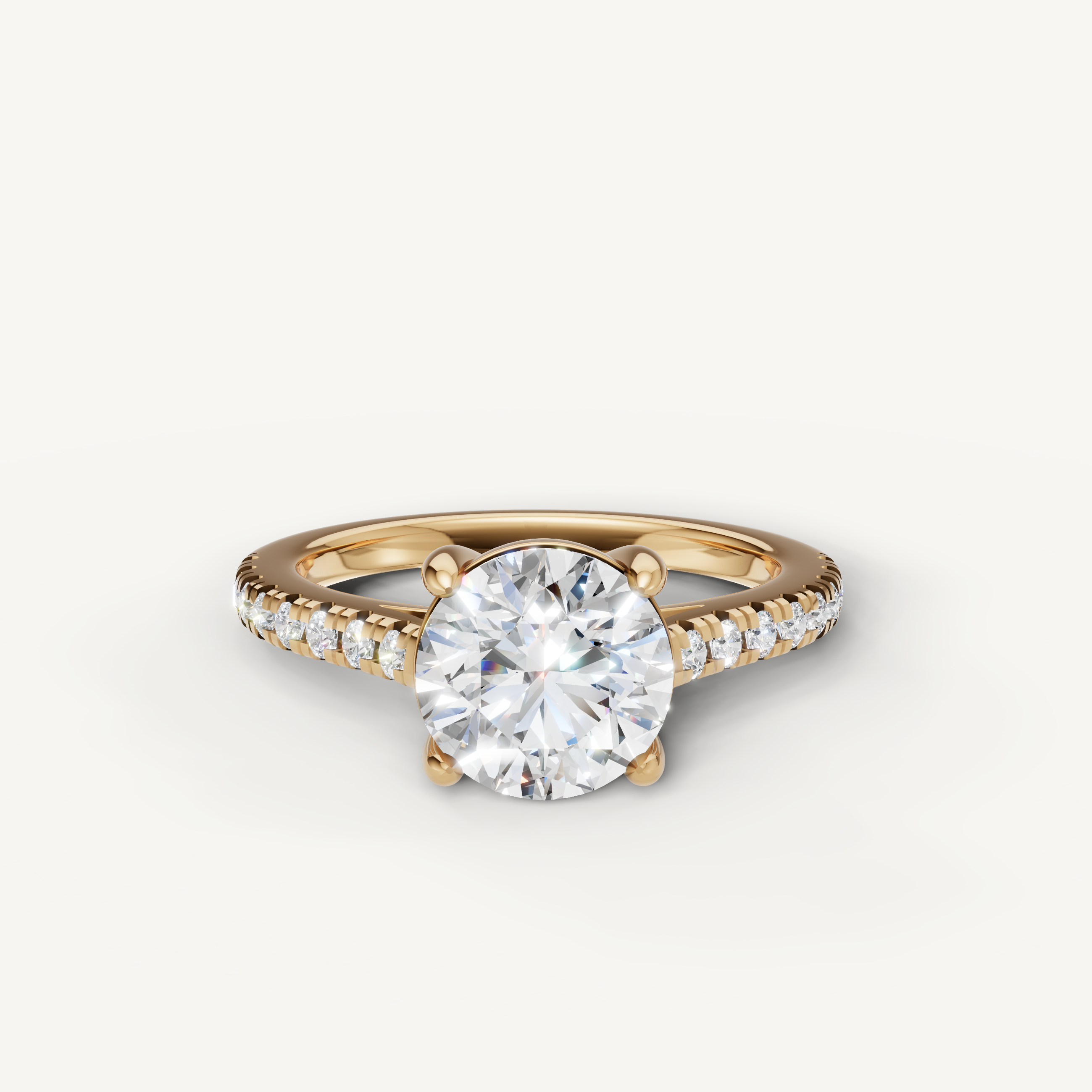 Round brilliant cut lab grown diamond engagement ring in 14K yellow gold with pavé band