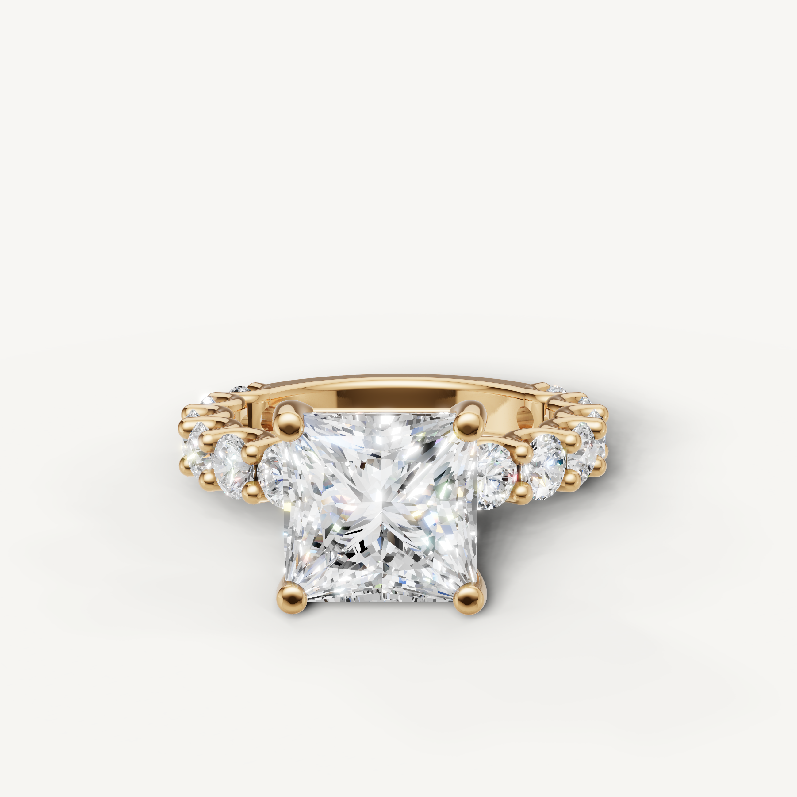 Yellow gold princess cut lab grown diamond engagement ring with shared prong round diamond eternity band by Raul Diamonds