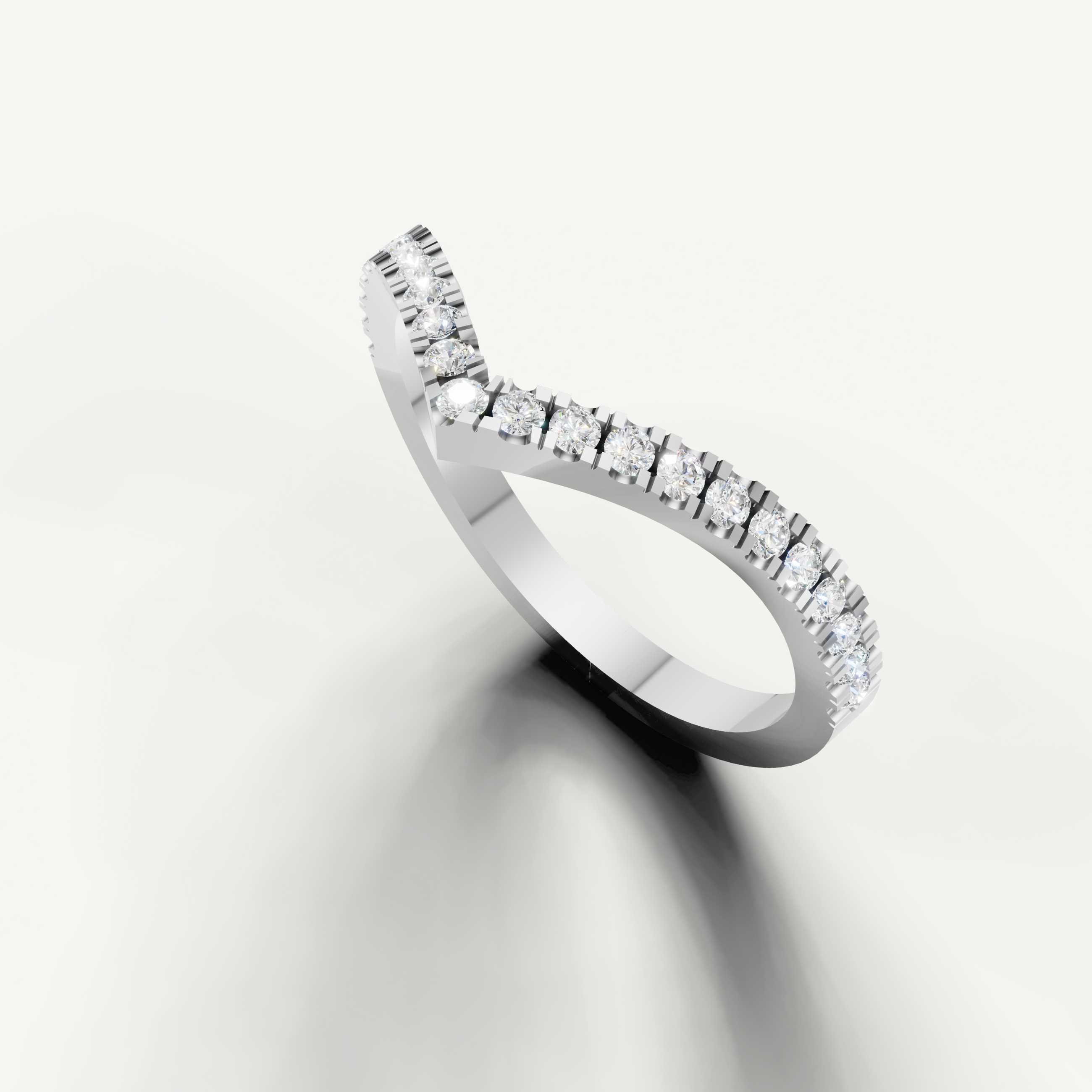 Elegant white gold pavé diamond chevron wedding band by Raul Diamonds