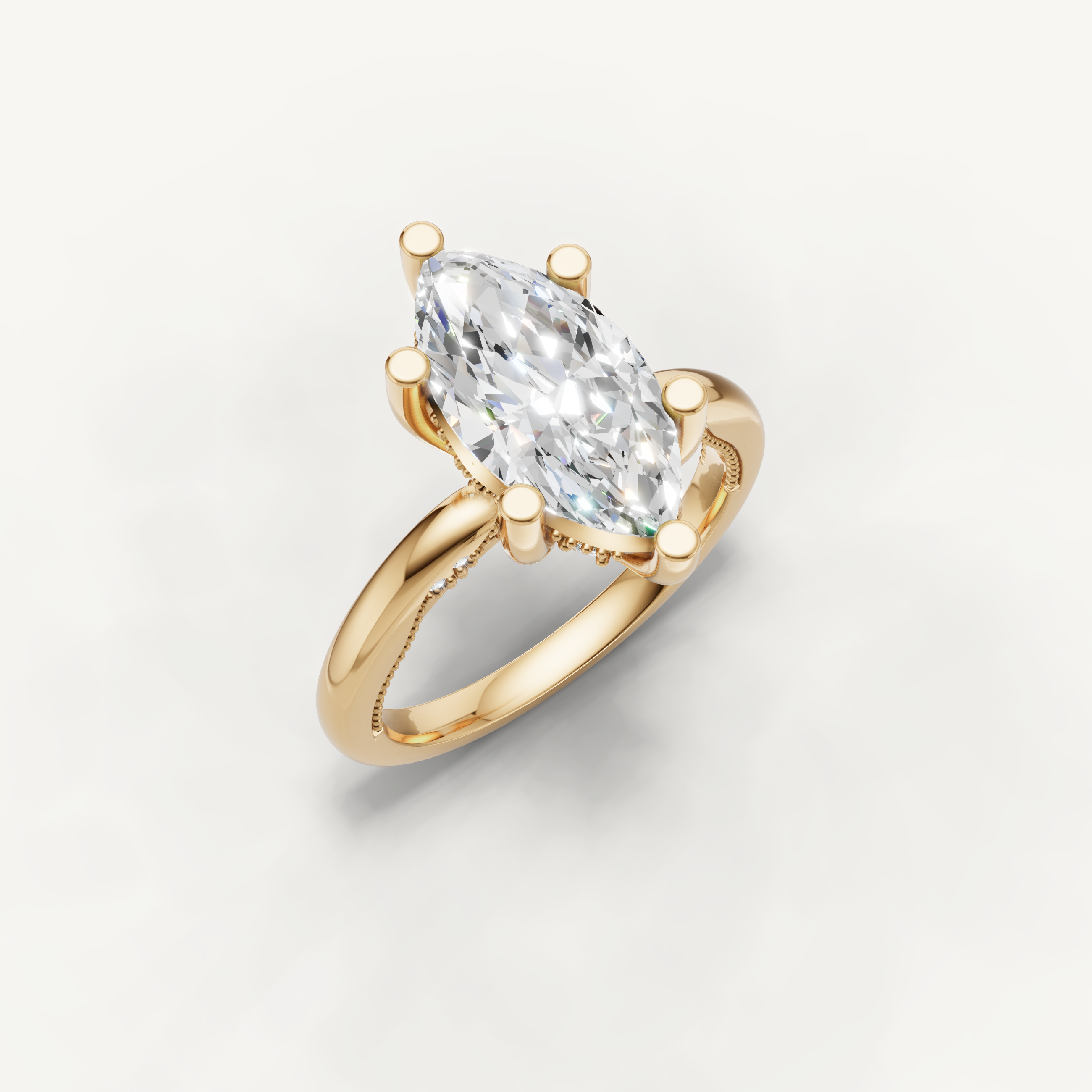 Elegant yellow gold marquise diamond engagement ring with classic solitaire setting by Raul Diamonds