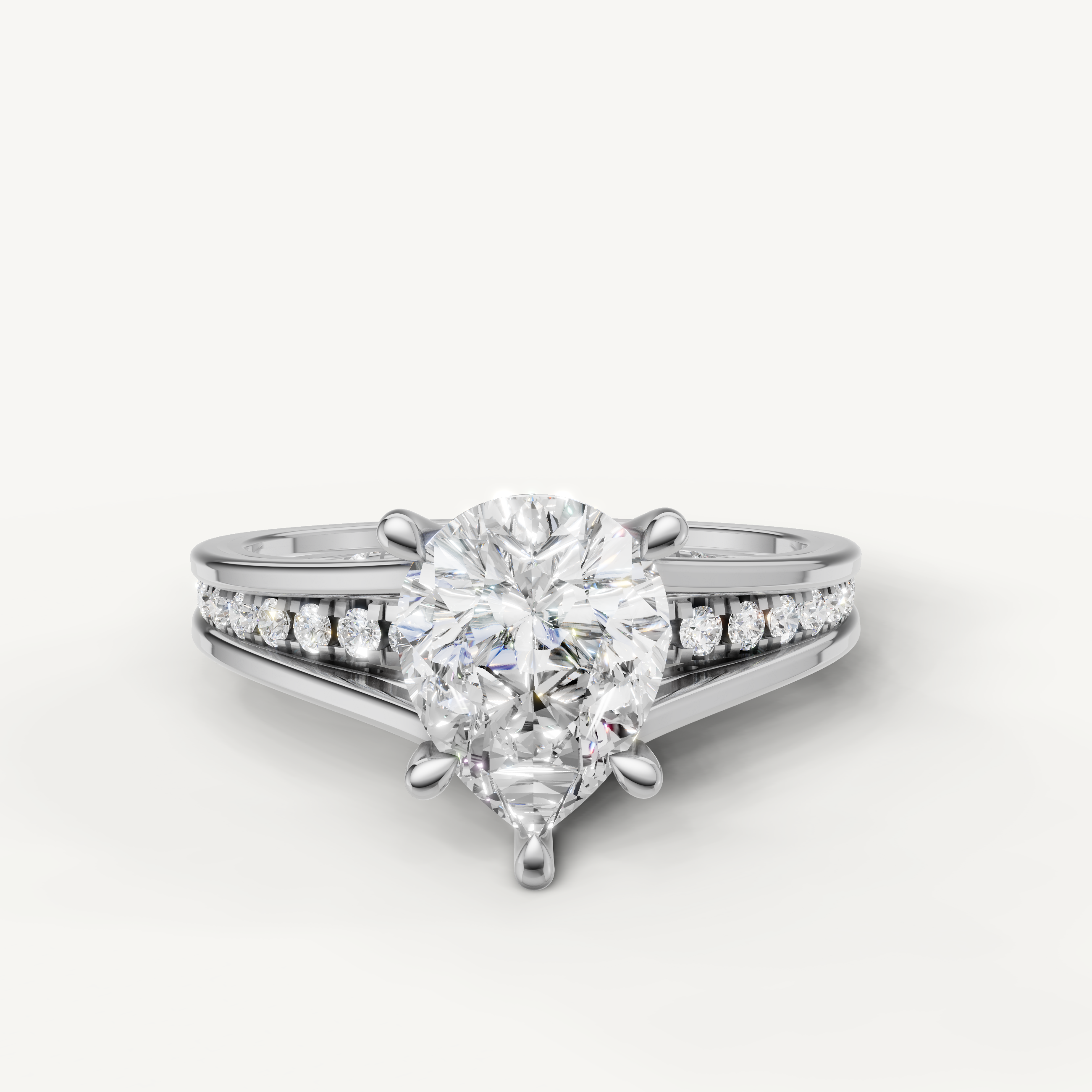 Raul Diamonds white gold pear cut engagement ring with split shank diamond band
