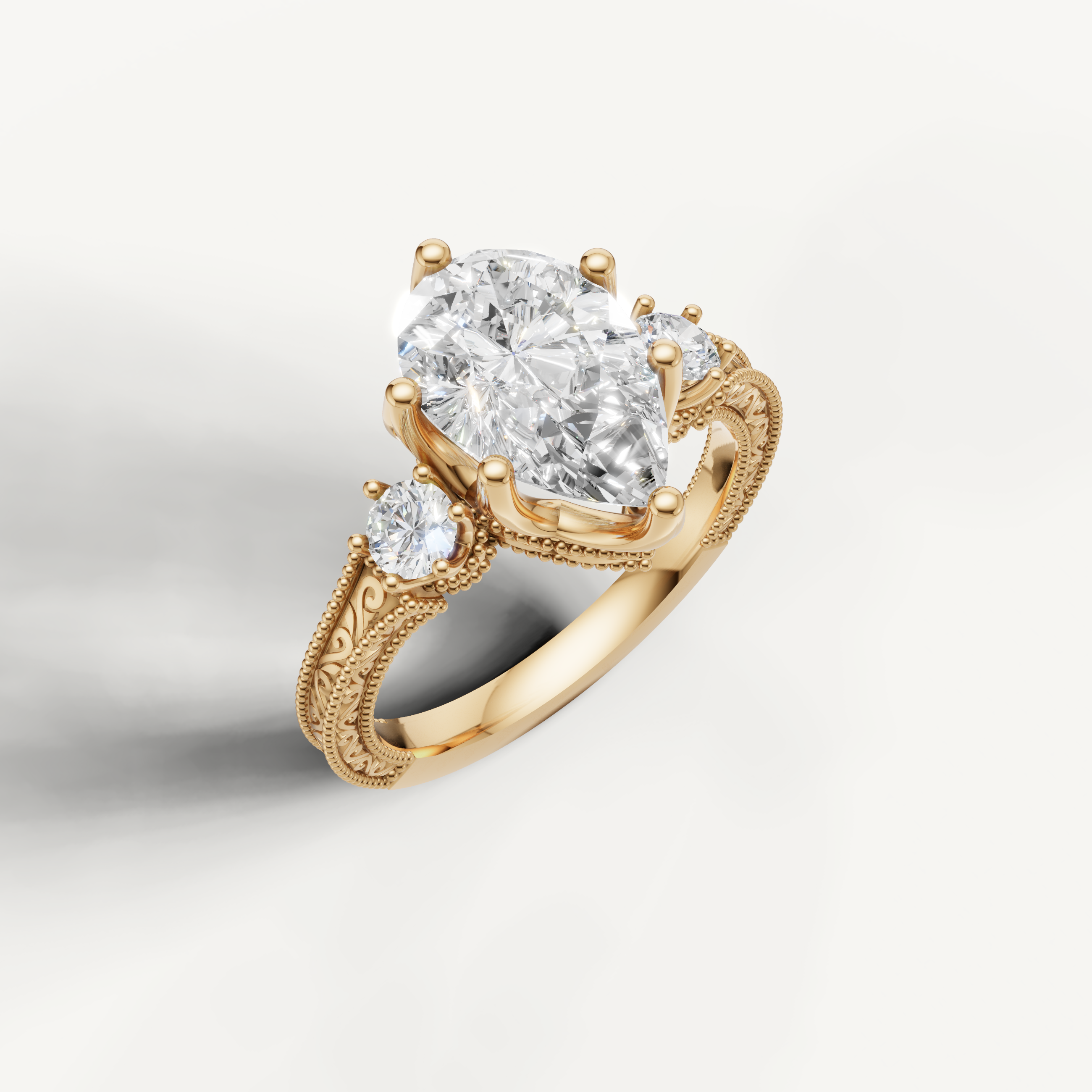 14K Yellow Gold Pear Diamond Ring with Floral Engraved Vintage Band – Raul Diamonds