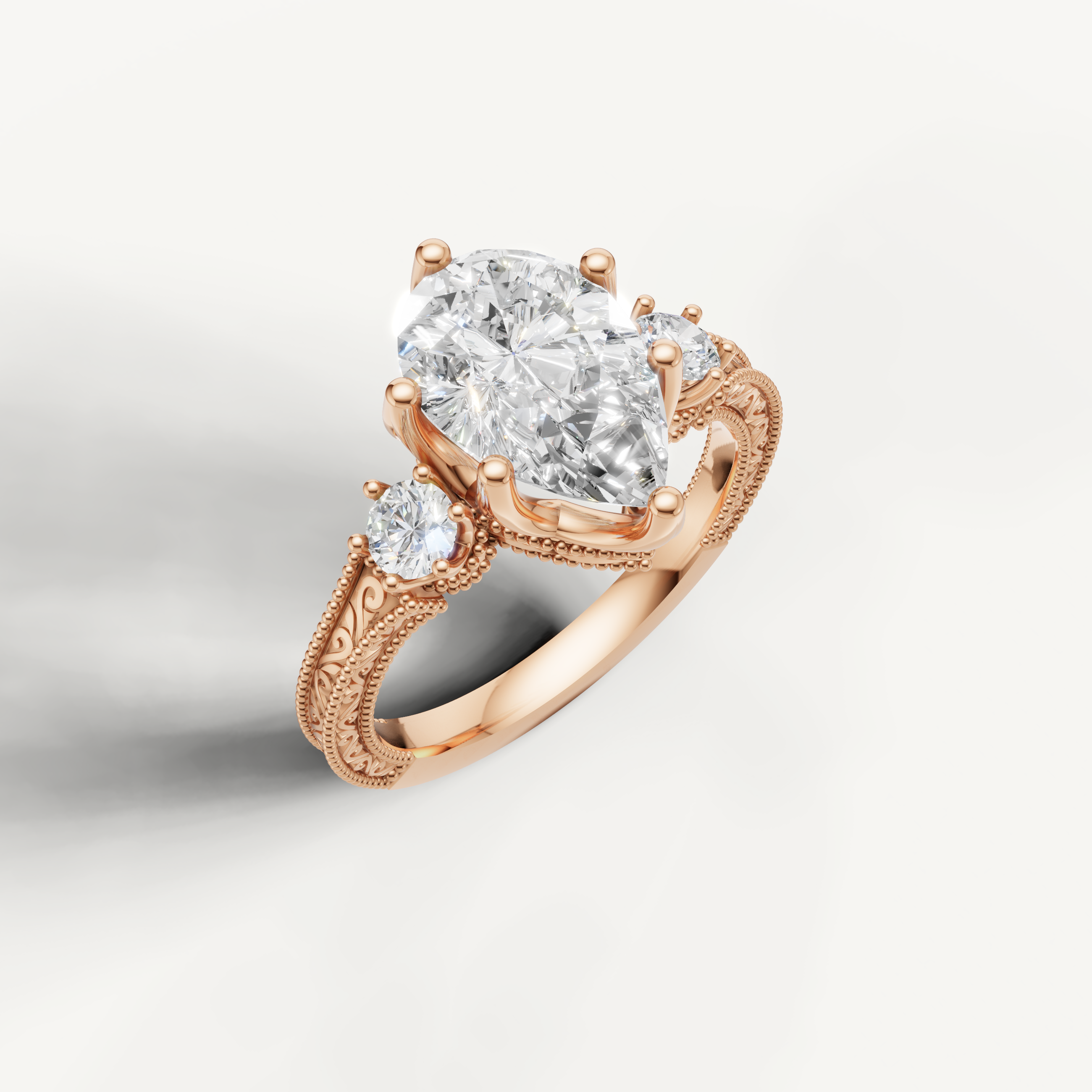 Rose Gold Pear Diamond Engagement Ring with Intricate Floral Band – Raul Diamonds