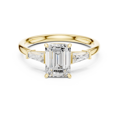 Emerald cut lab grown diamond three-stone ring tapered baguettes