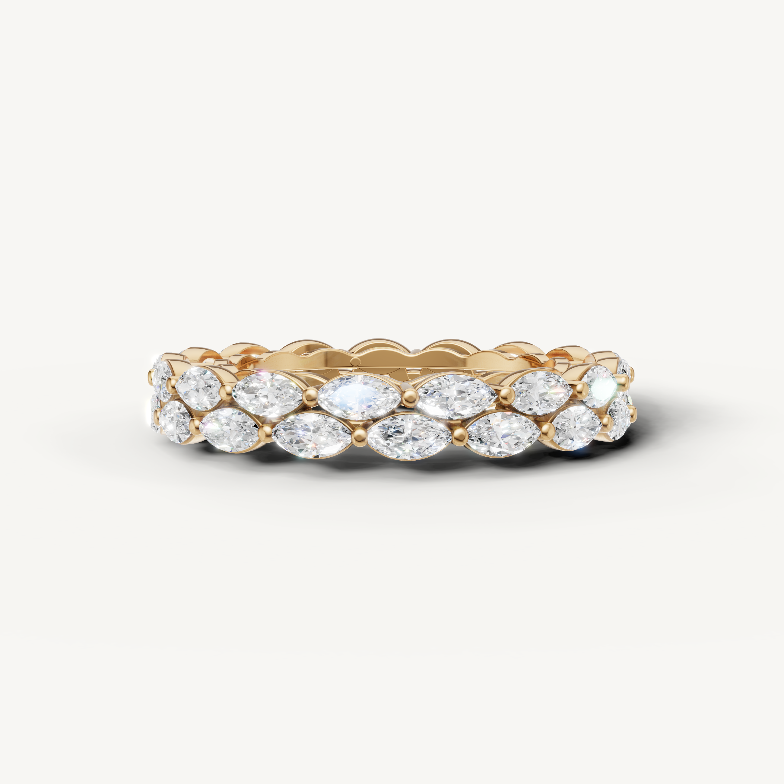marquise cut lab grown diamond eternity band in 14k yellow gold with shared prong setting
