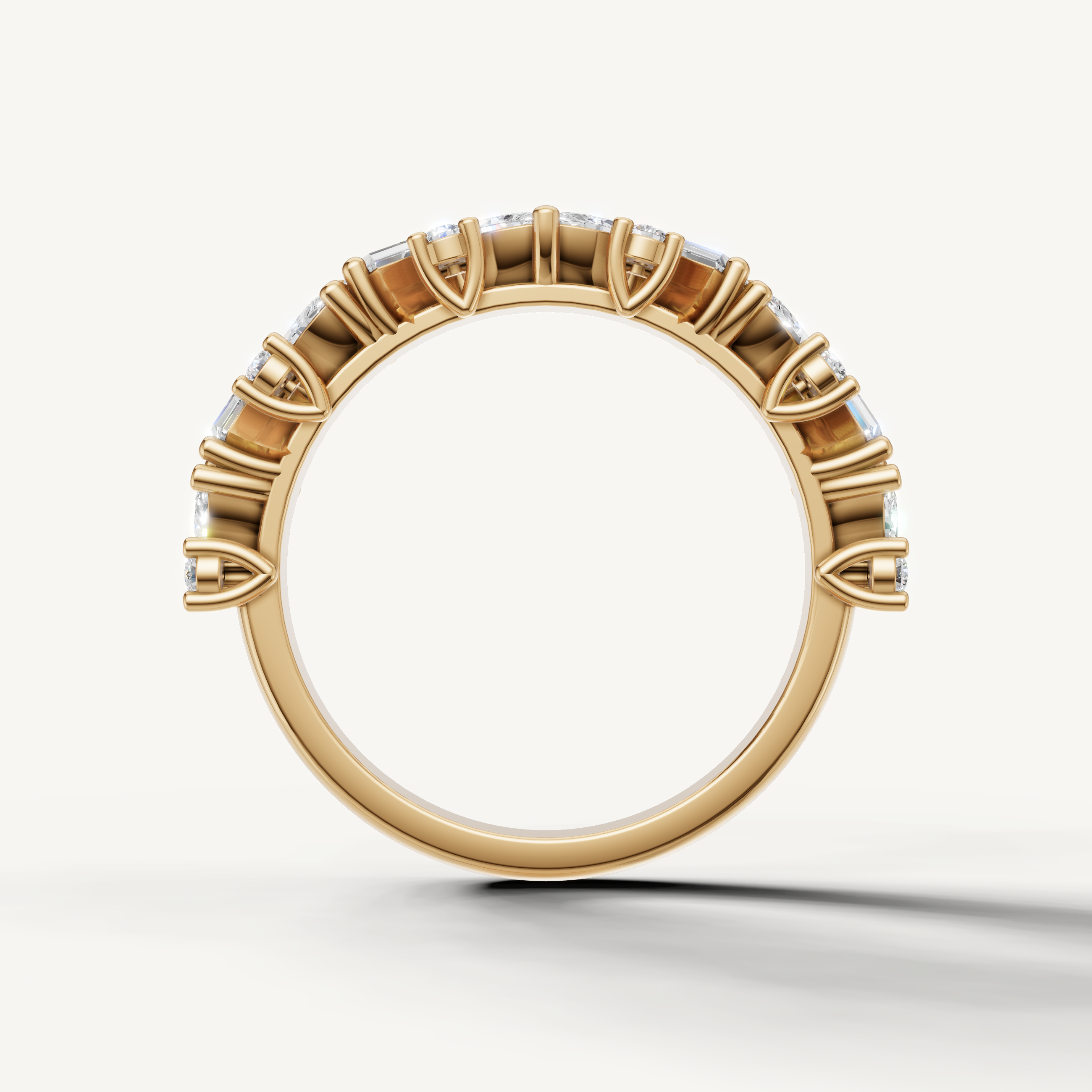 Modern yellow gold wedding band with alternating baguette and marquise diamonds for women
