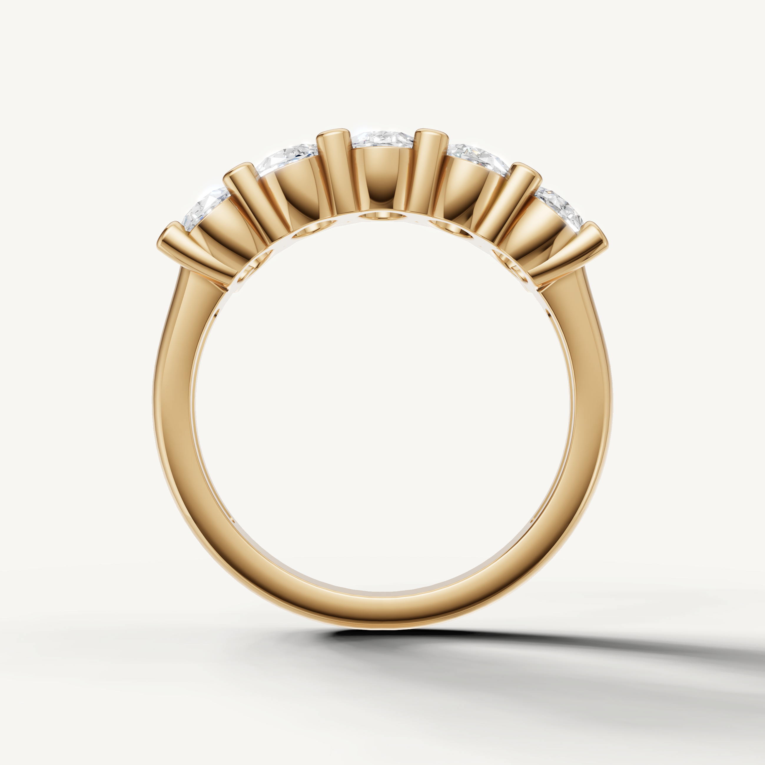 IGI certified oval diamond anniversary band in polished yellow gold