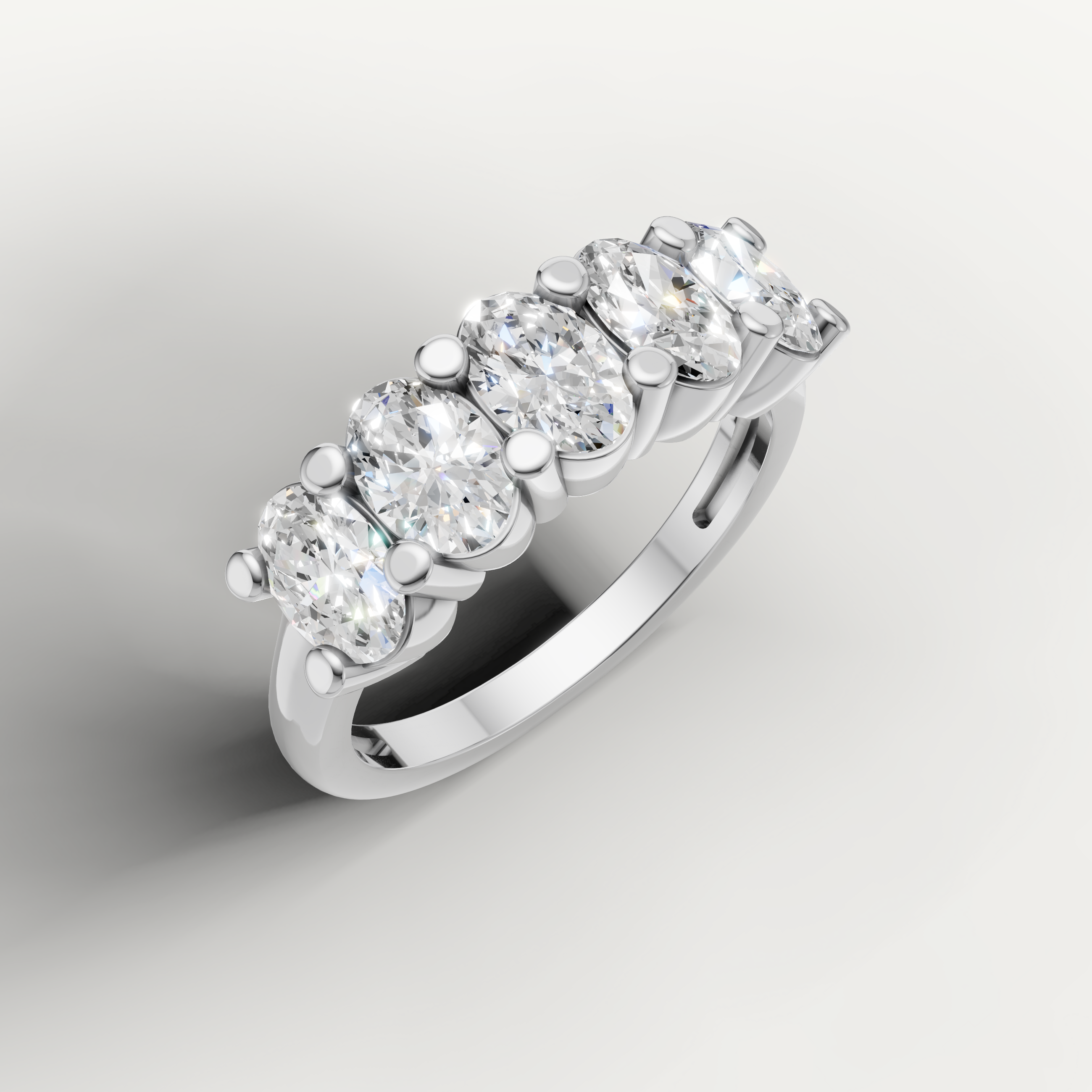 classic oval diamond wedding band with shared prong setting and timeless brilliance