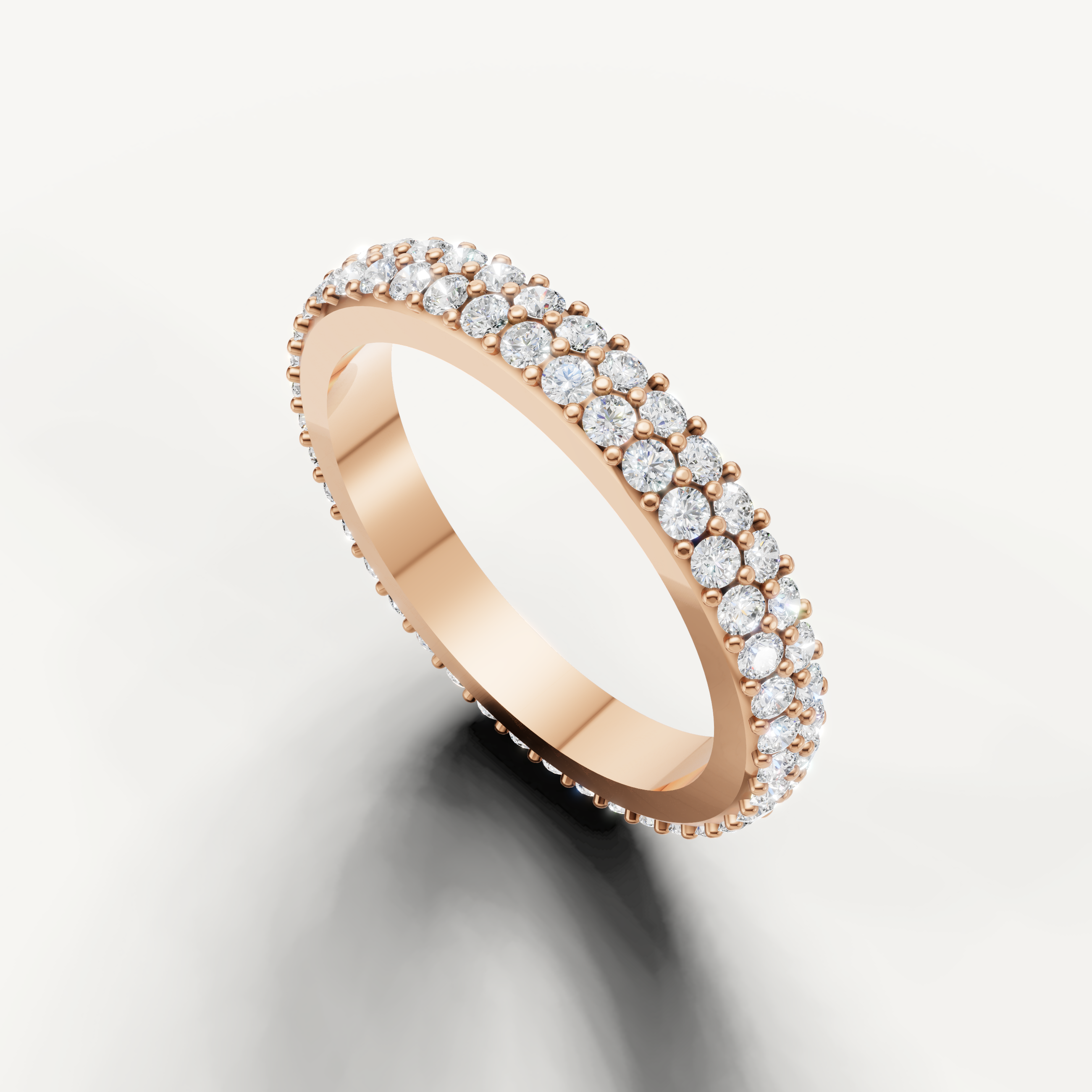 Fine rose gold eternity wedding band featuring double row diamonds by Raul Diamonds