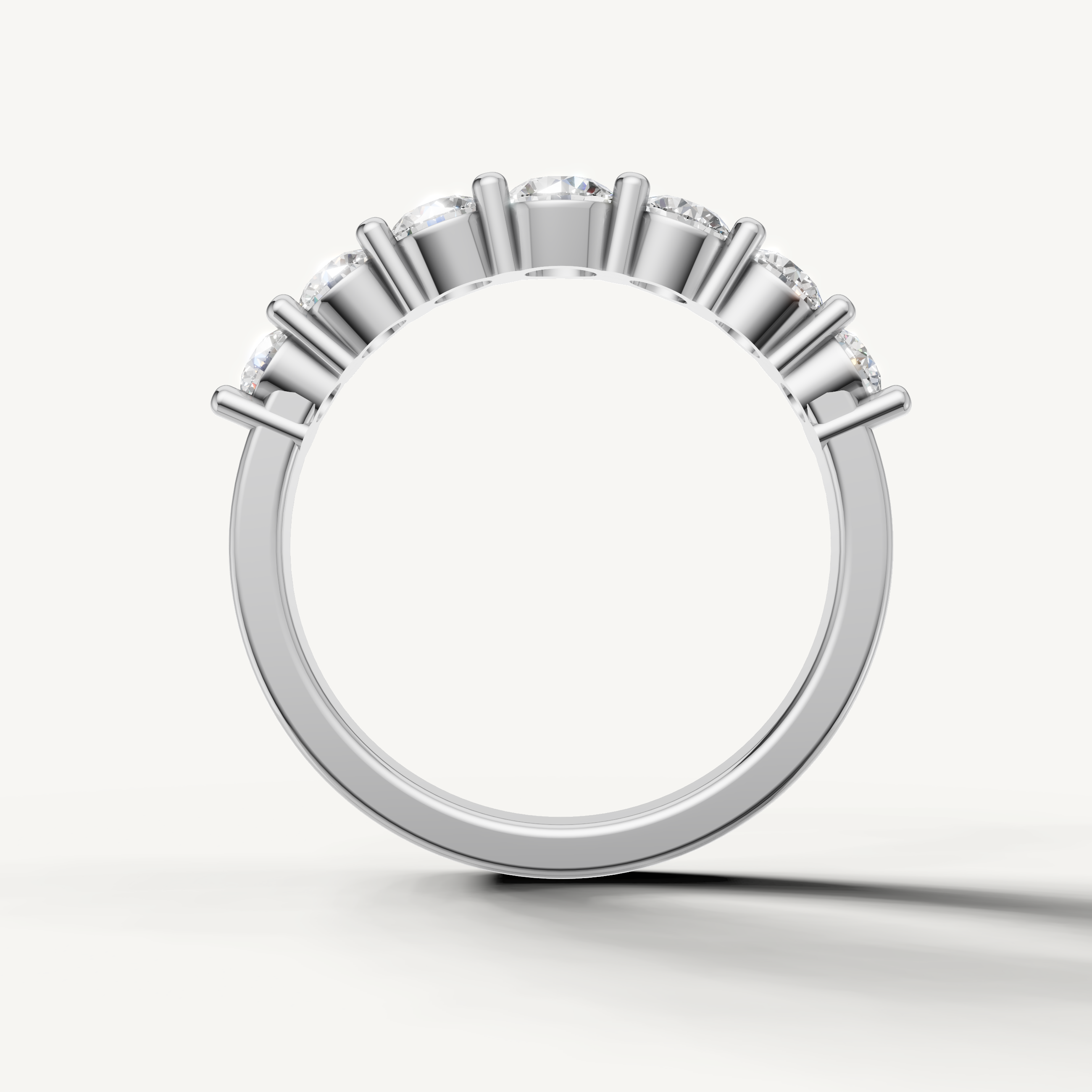 Designer white gold wedding band featuring classic round brilliant diamonds for women