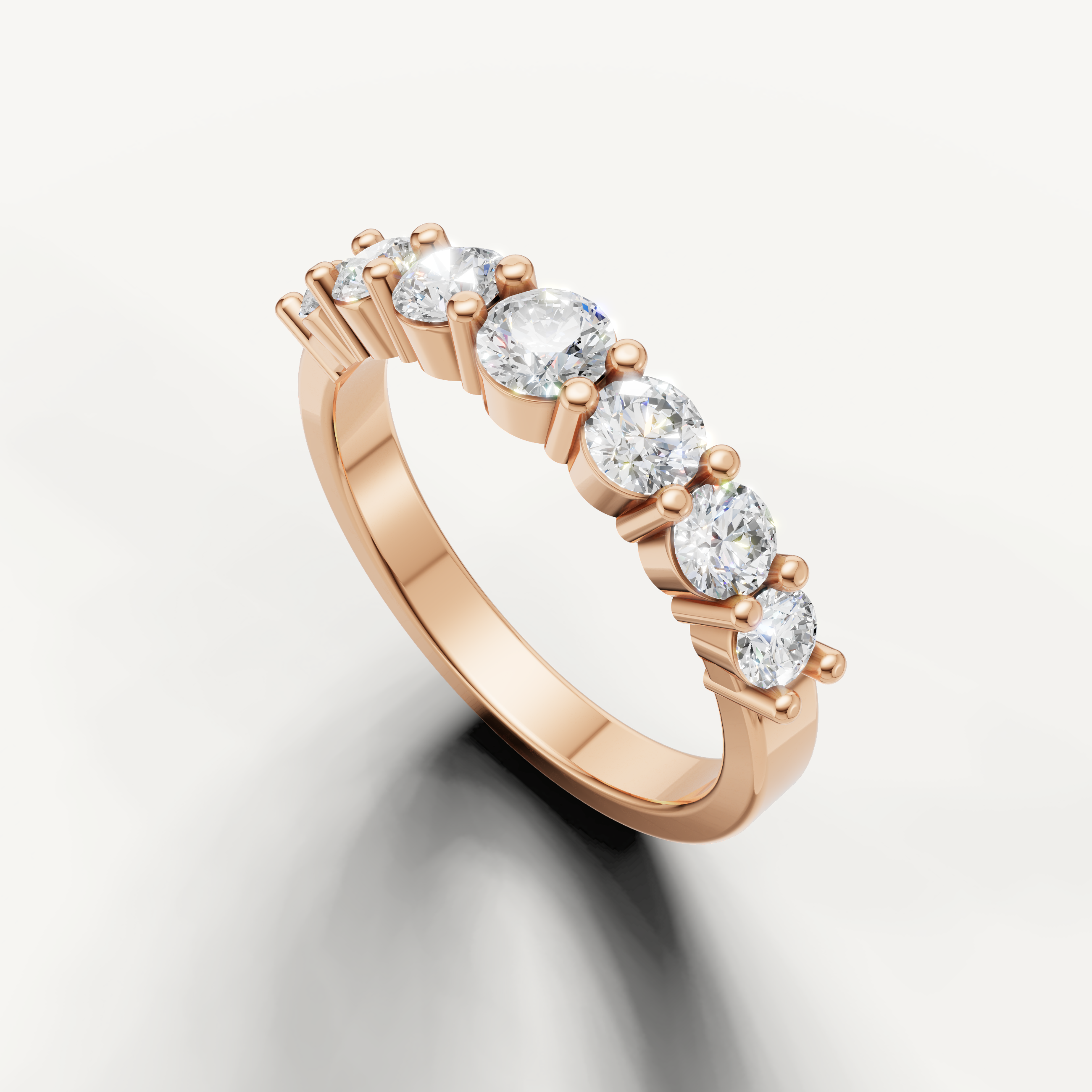 Fine rose gold anniversary wedding band featuring sparkling round cut diamonds by Raul Diamonds