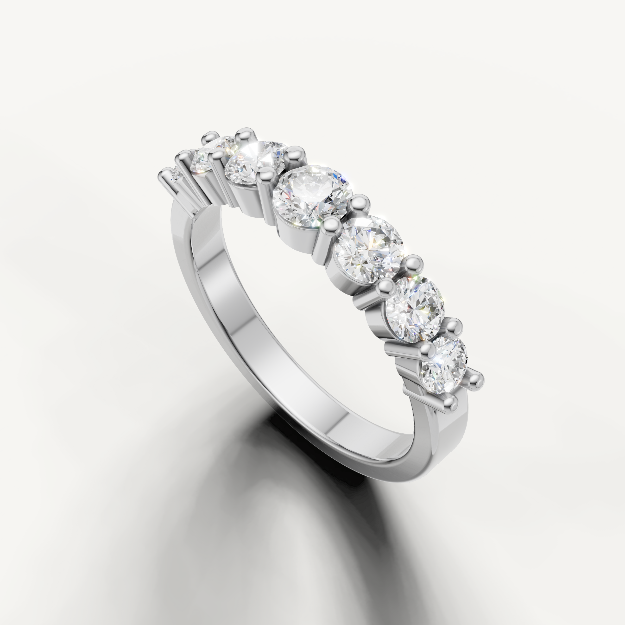 Modern white gold anniversary wedding band by Raul Diamonds with sparkling round stones