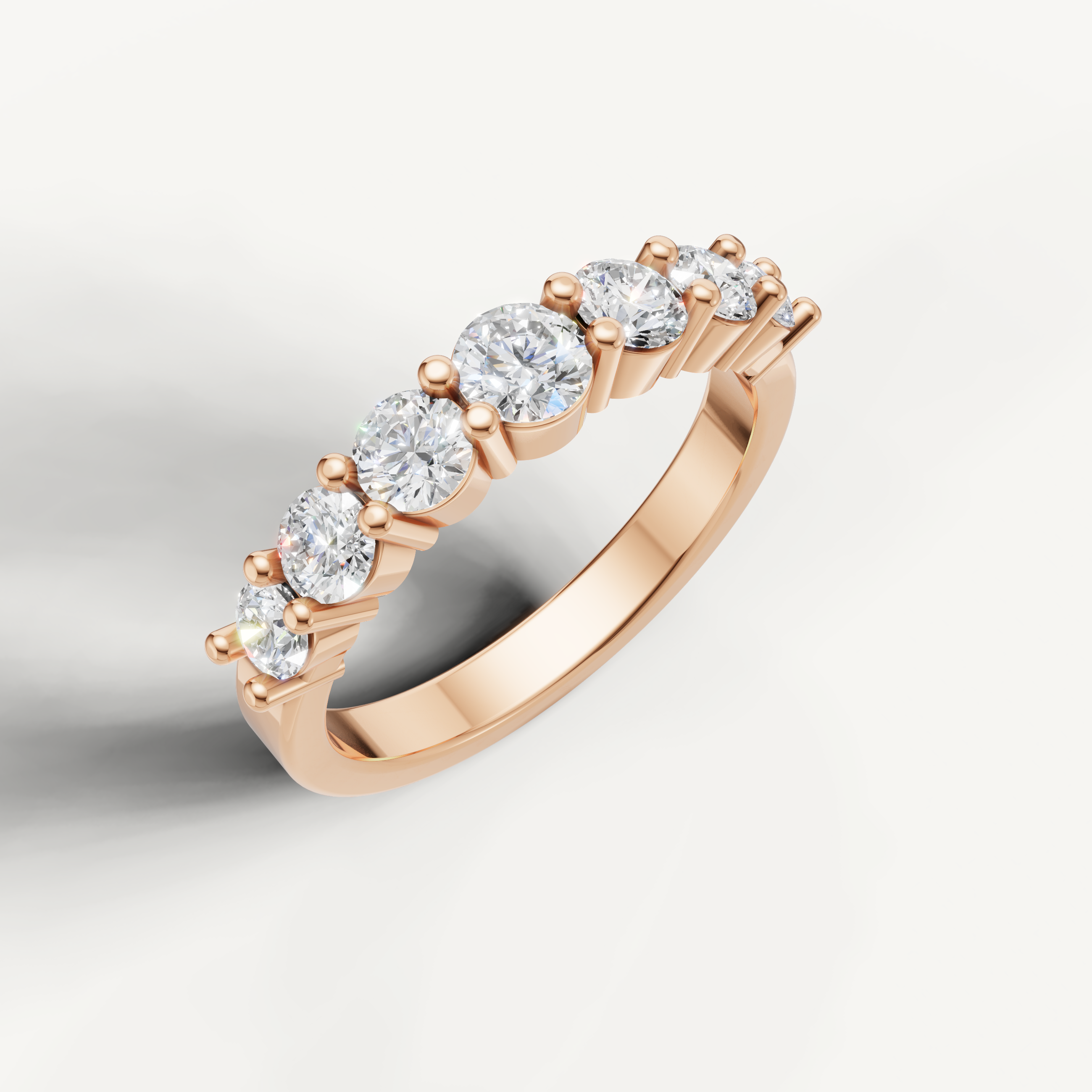 Contemporary rose gold diamond wedding band with round brilliant stones for women