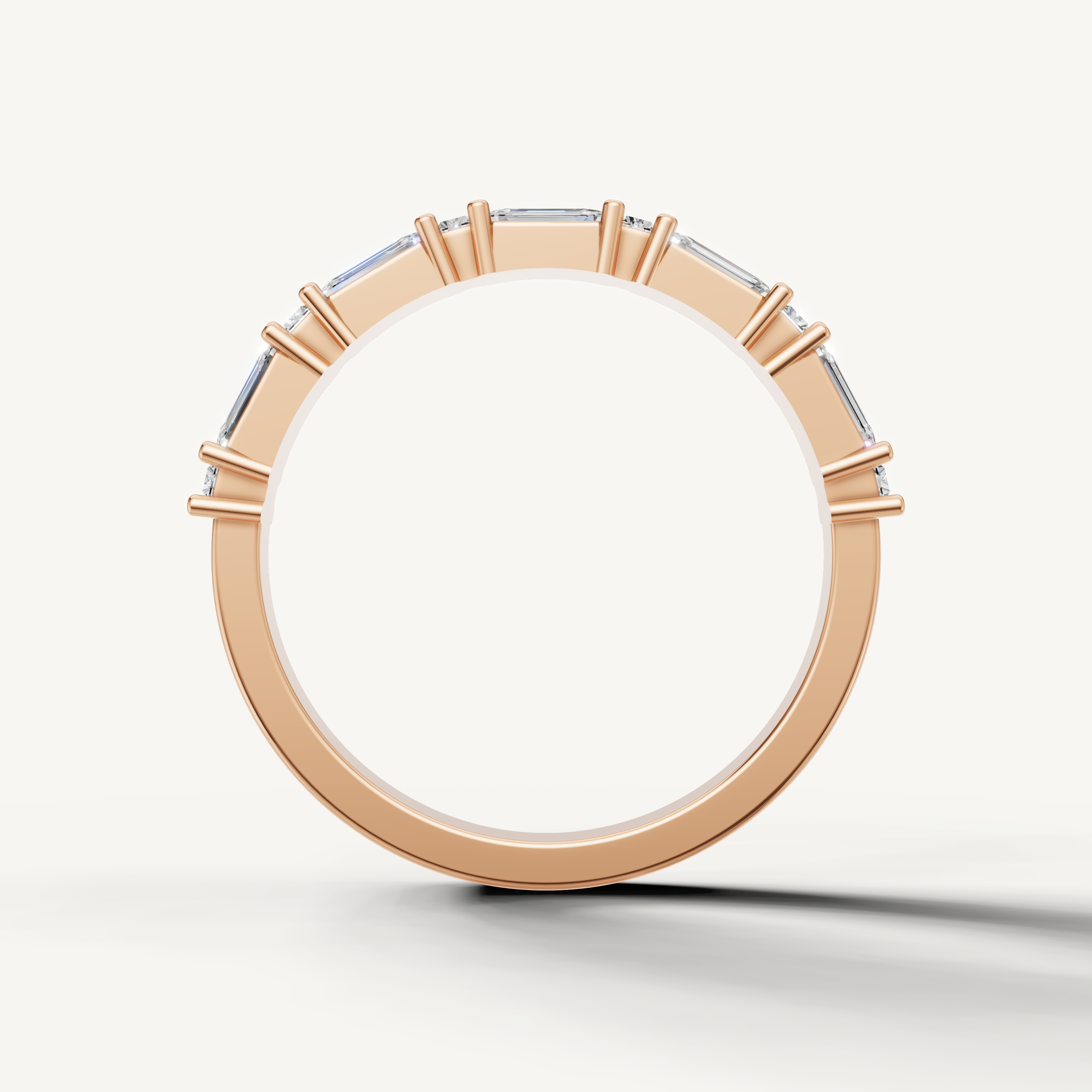Fine rose gold emerald cut diamond wedding band crafted with modern elegance by Raul Diamonds