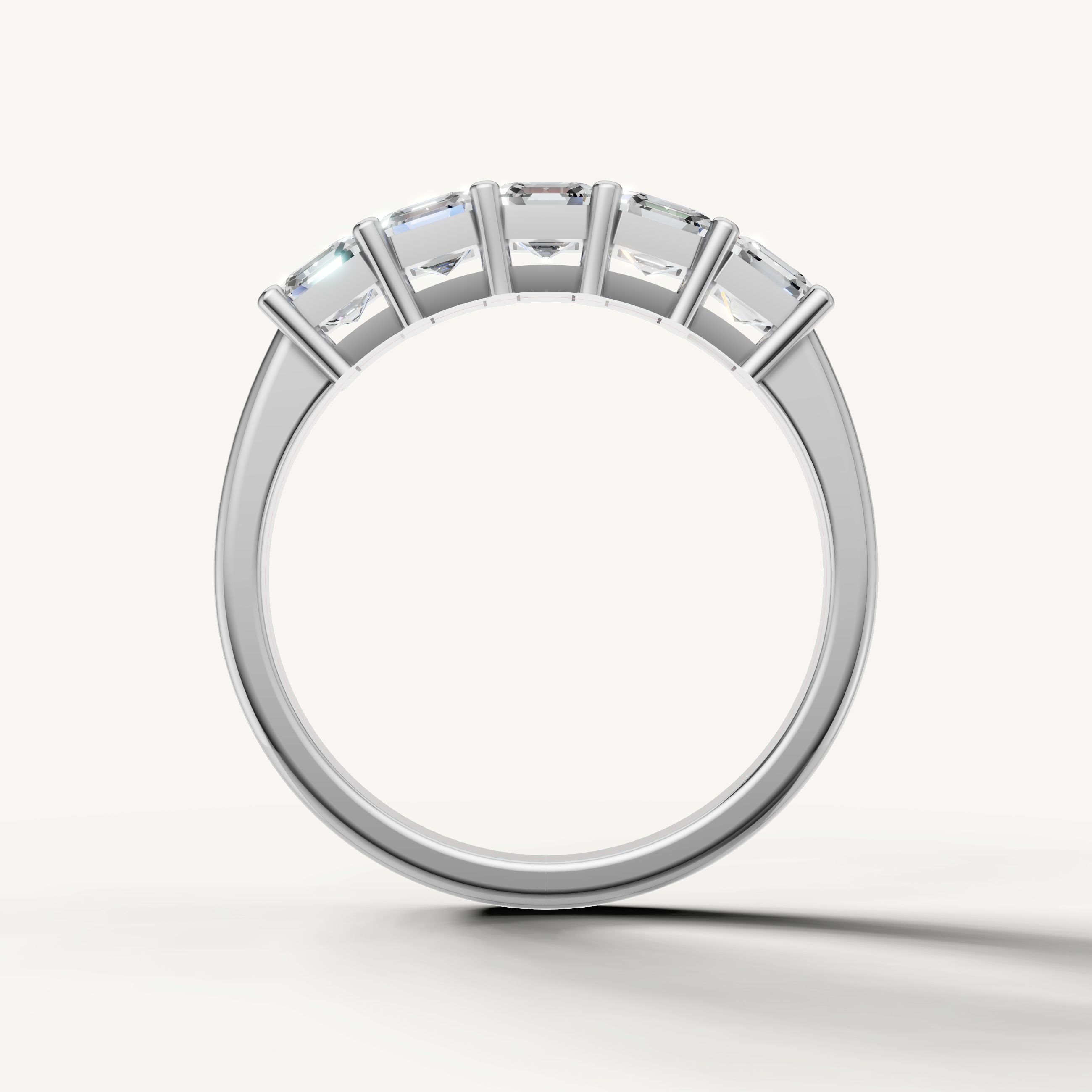 Fine white gold wedding band with sparkling Asscher cut diamonds from Raul Diamonds