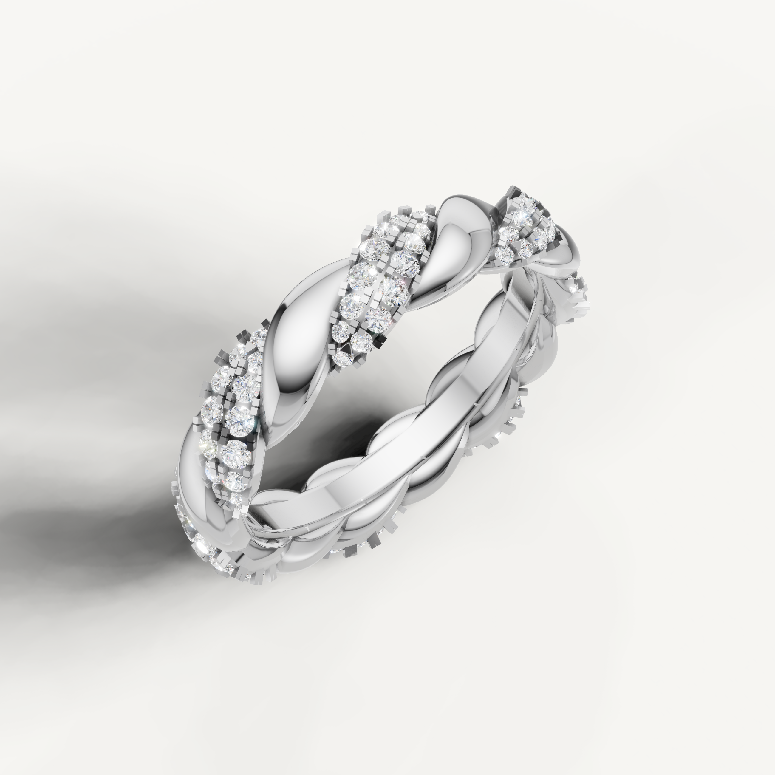 Elegant white gold diamond wedding ring with luxury twisted braid design by Raul Diamonds