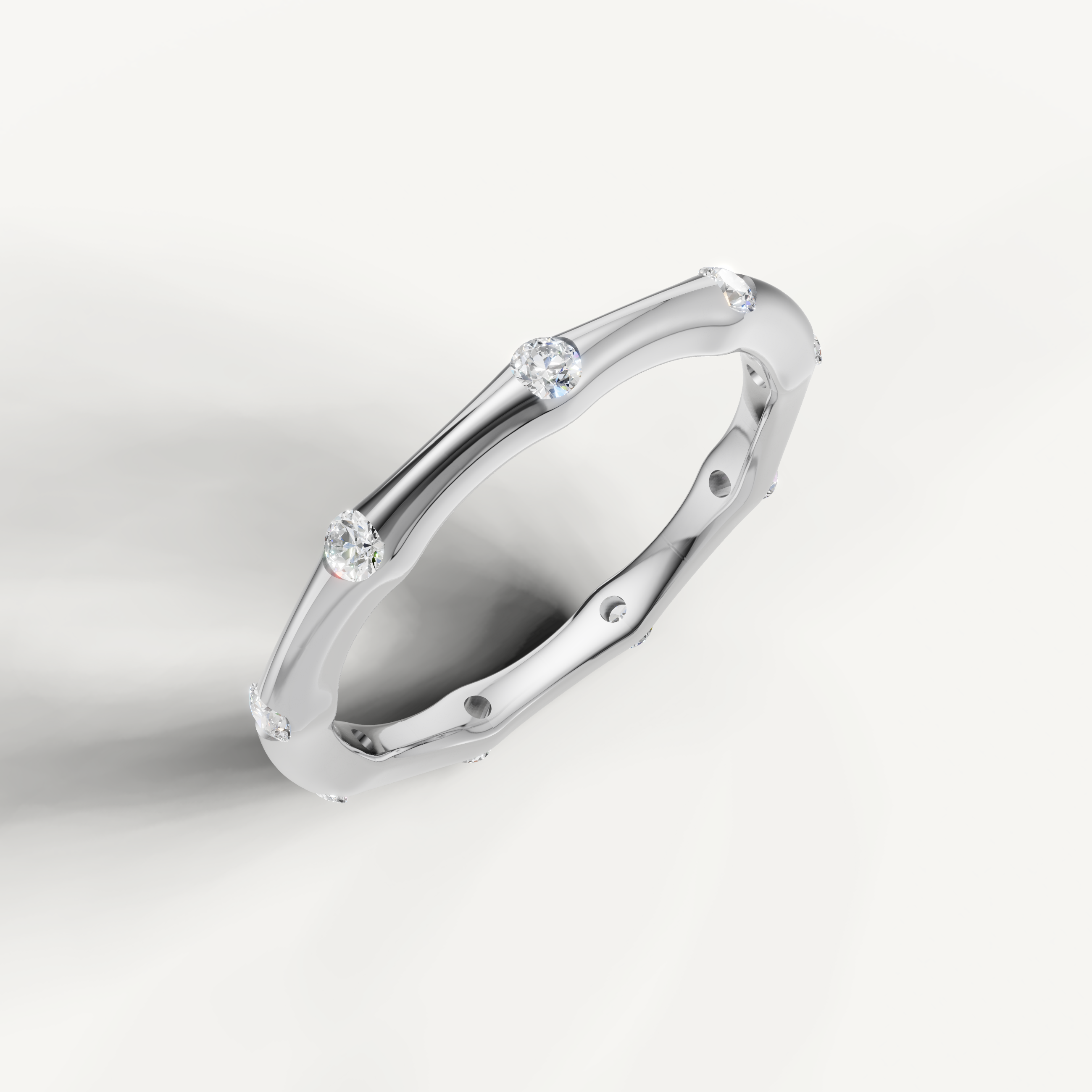 White gold floating diamond wedding ring featuring elegant contour styling by Raul Diamonds