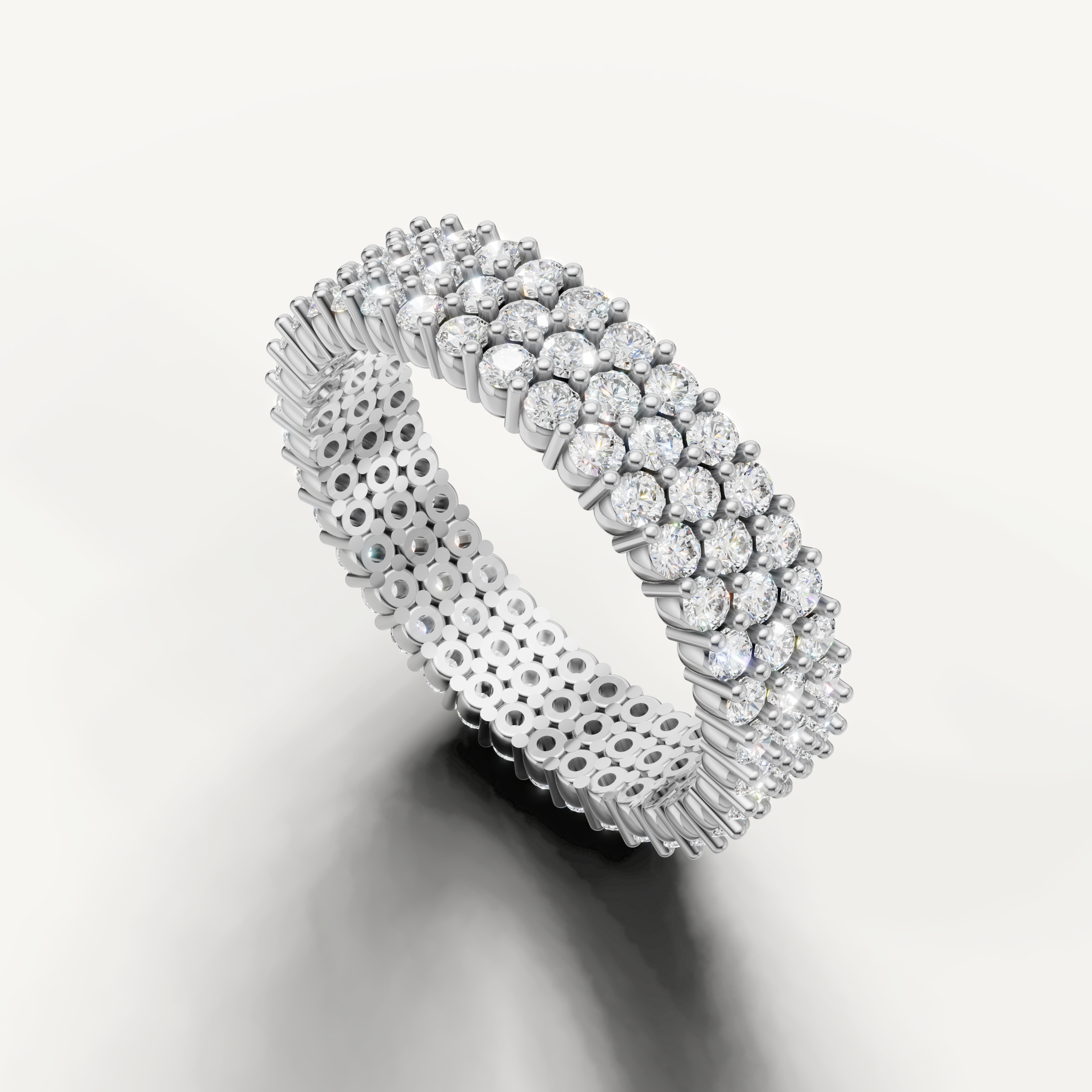 Luxury white gold wedding band with sparkling round diamonds and wide eternity band styling from Raul Diamonds