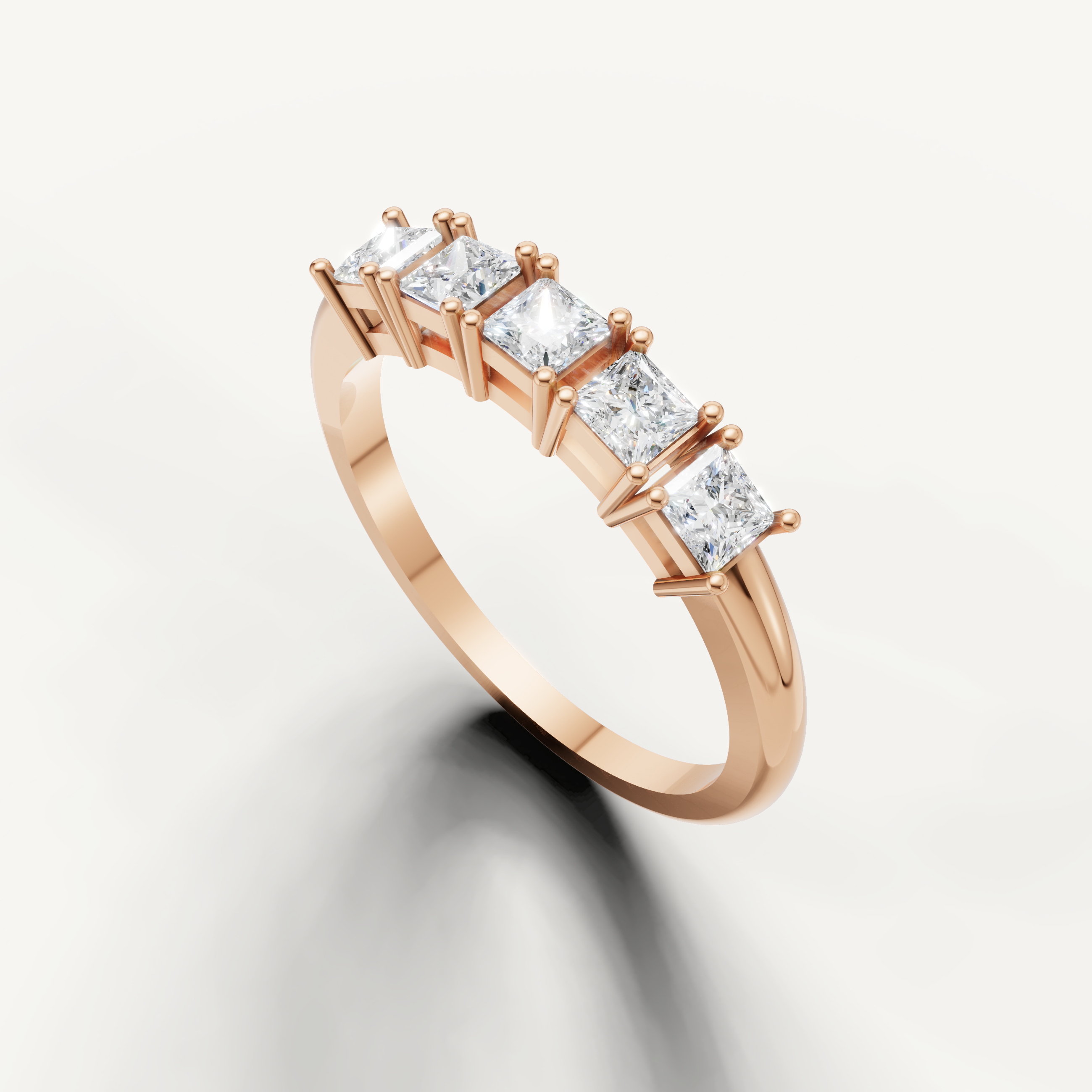Designer rose gold anniversary band featuring five princess diamonds from Raul Diamonds