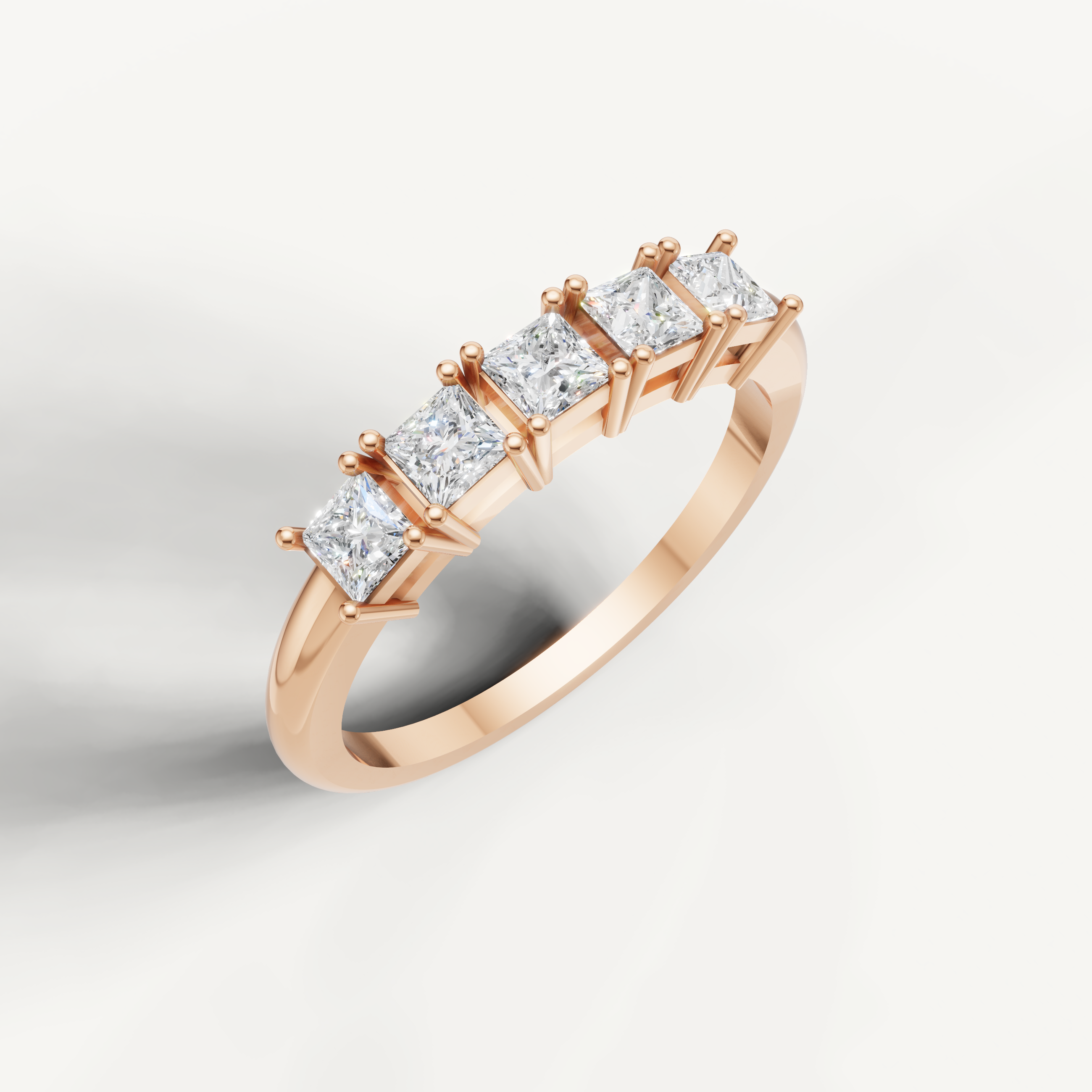 Romantic rose gold diamond wedding ring by Raul Diamonds with princess cut diamonds