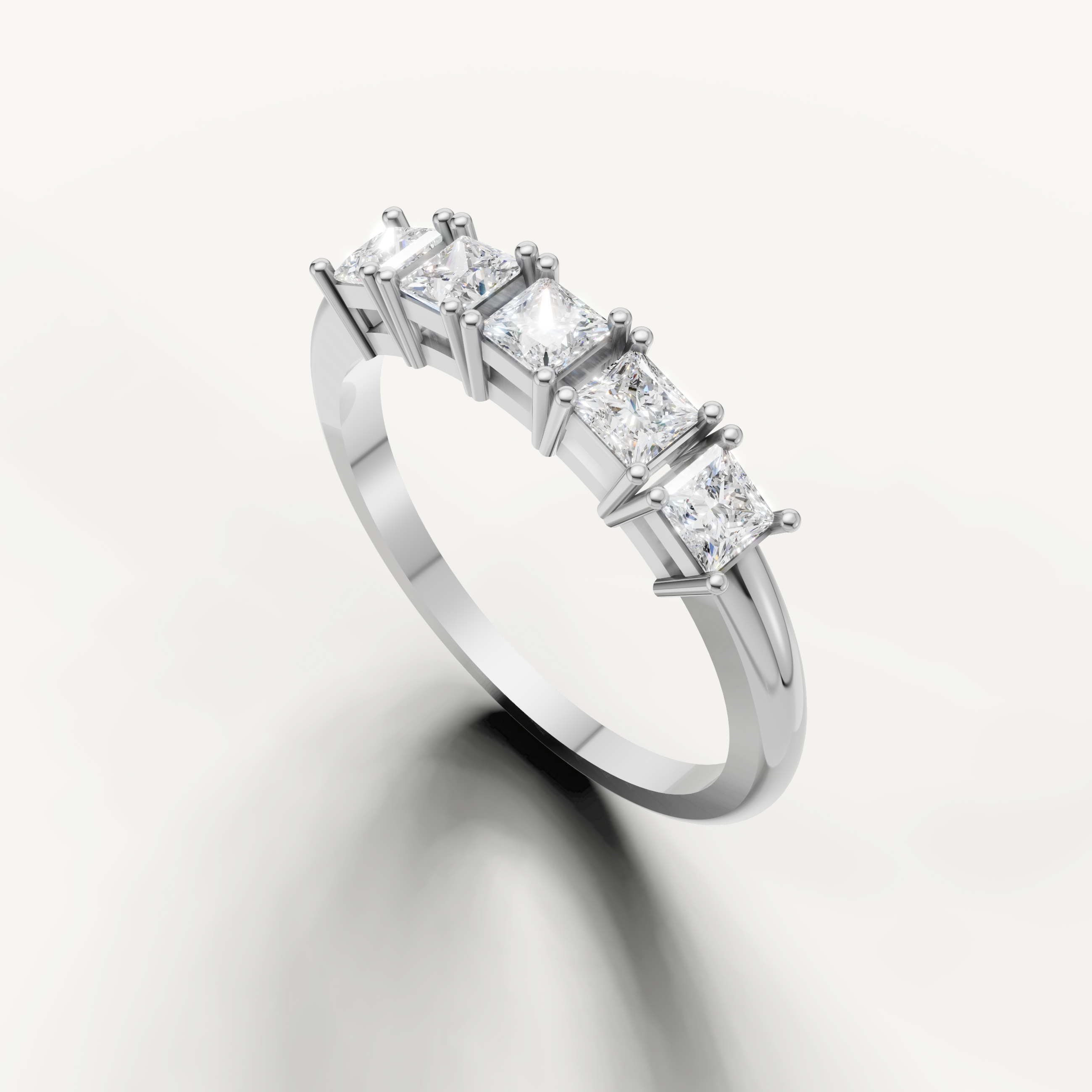 Contemporary white gold diamond wedding band with princess cut stones from Raul Diamonds