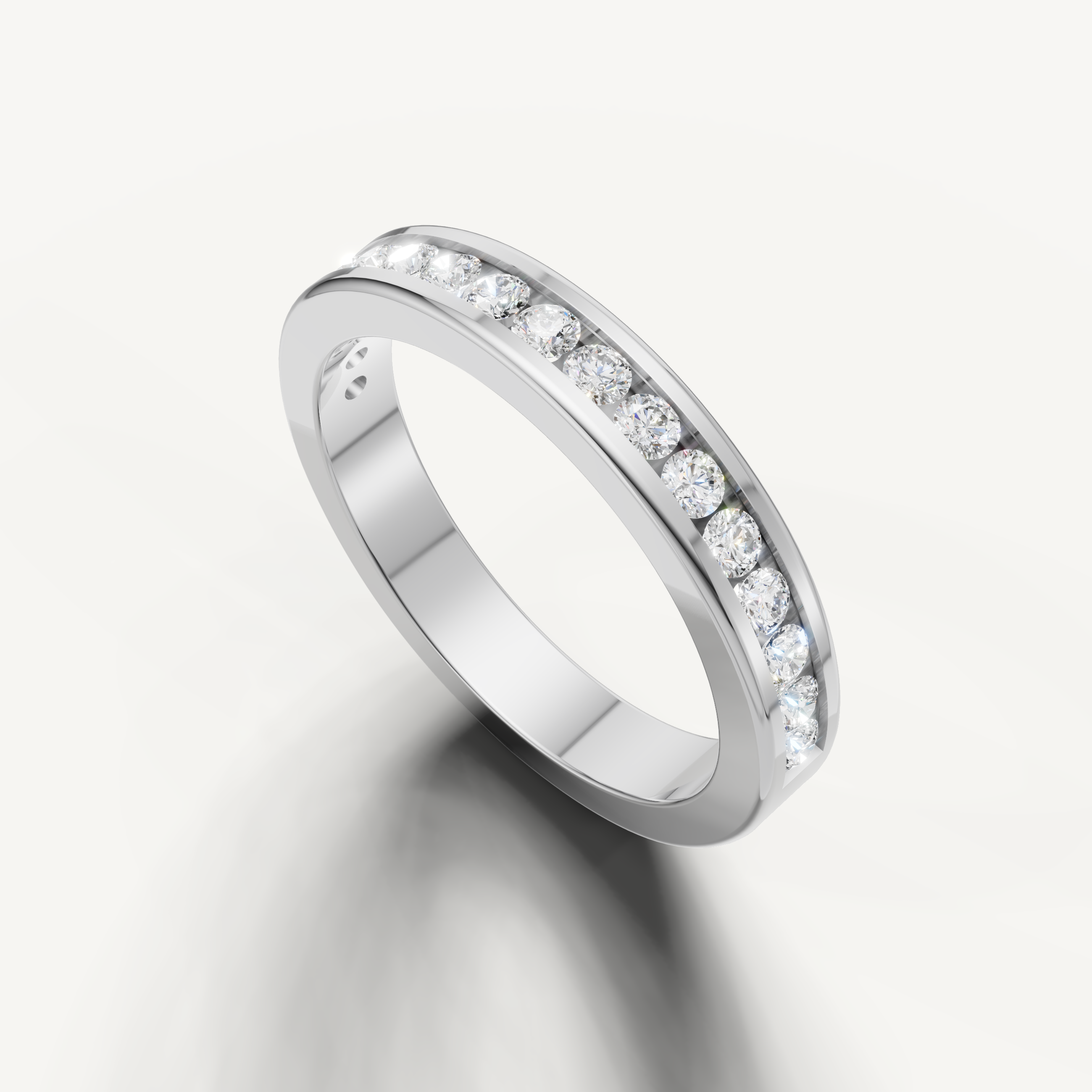 Luxury white gold diamond anniversary band with polished channel setting from Raul Diamonds