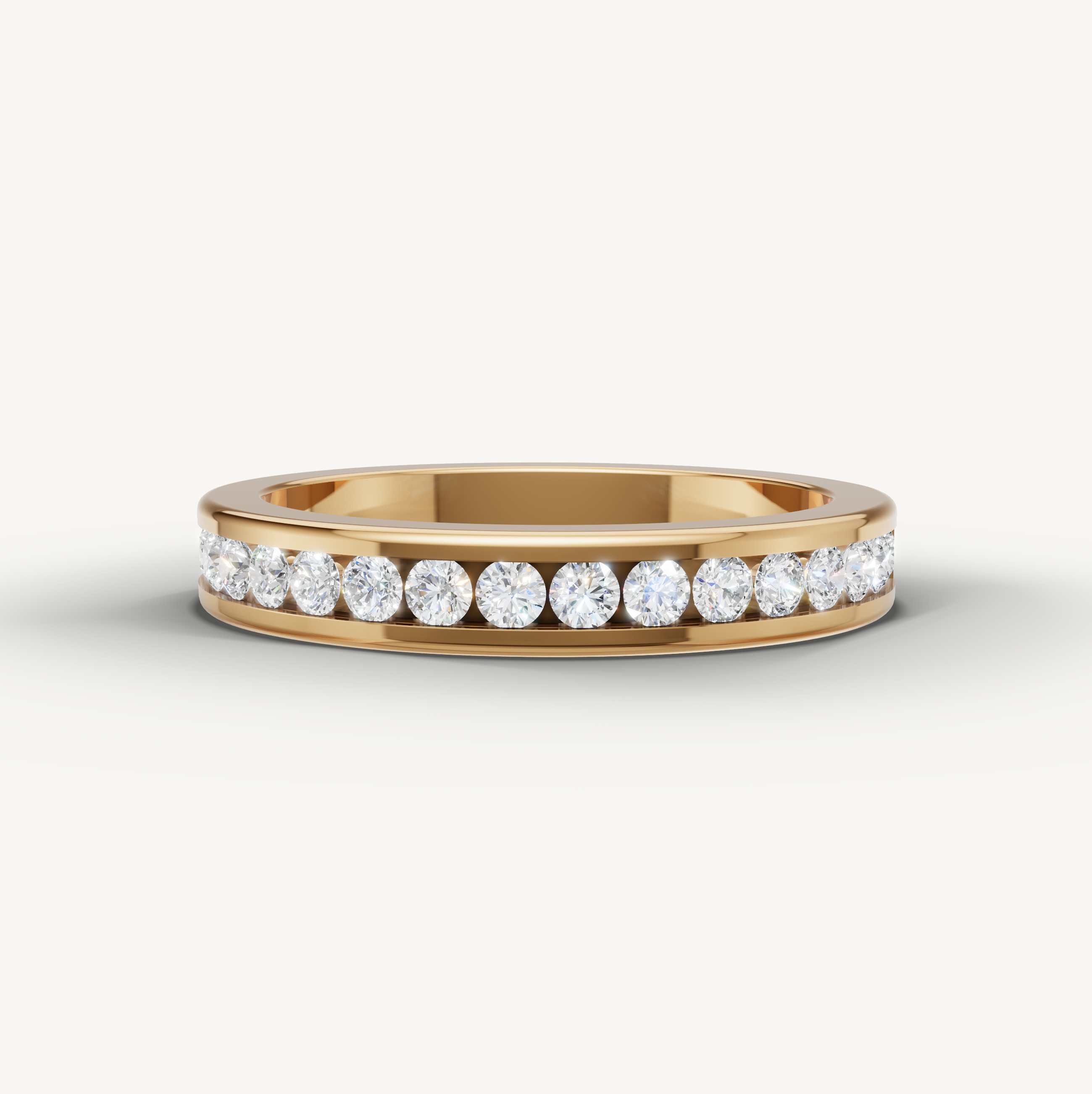 Round lab grown diamond channel set wedding band in 14K yellow gold by Raul Diamonds