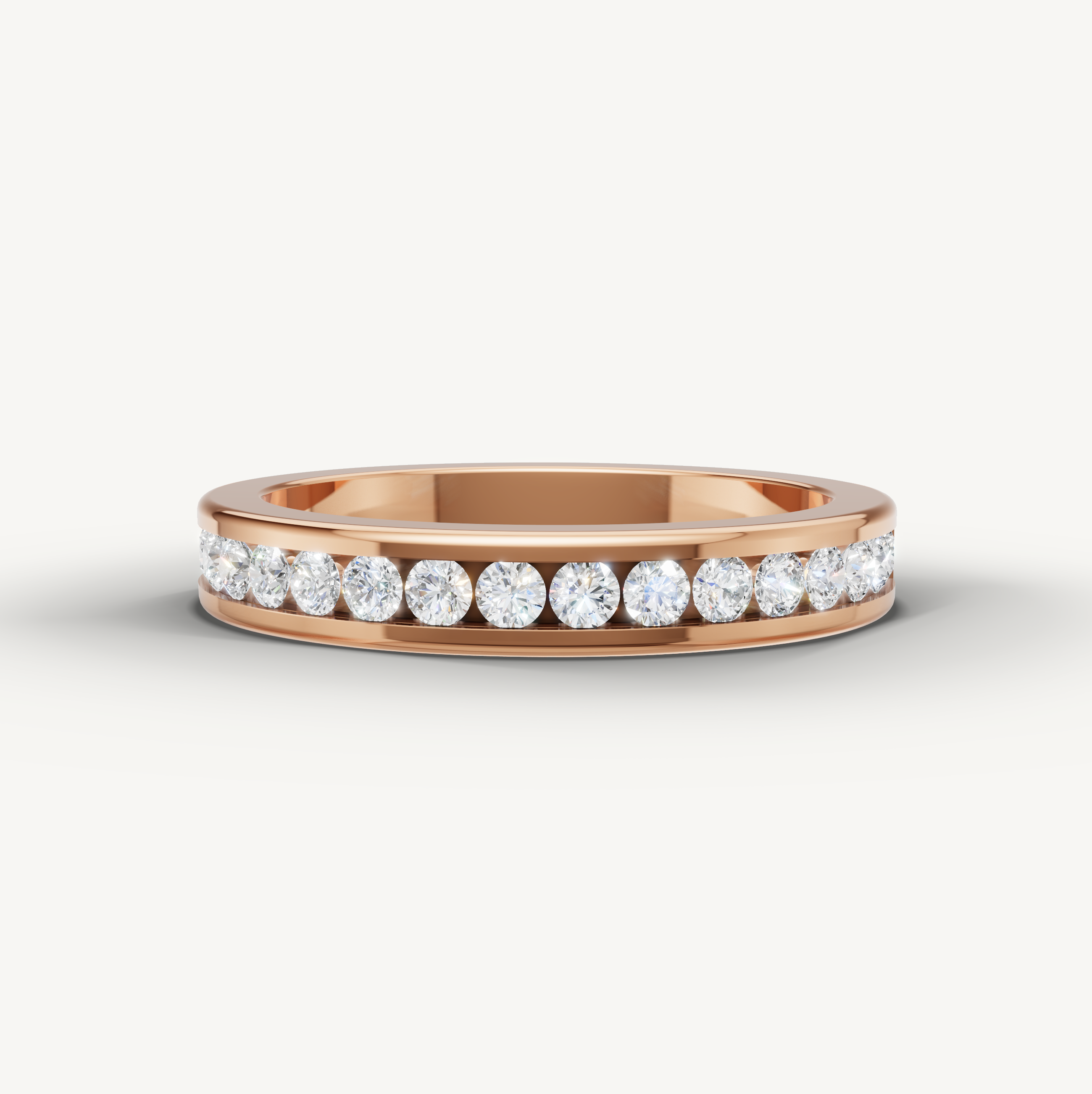 Round lab grown diamond channel set wedding band in 14K rose gold by Raul Diamonds