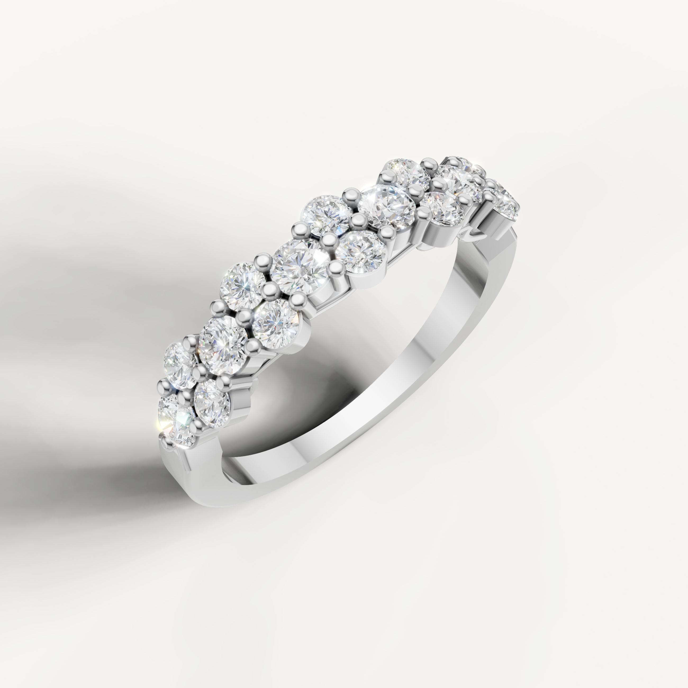 Elegant white gold cluster diamond wedding ring by Raul Diamonds with floral styling