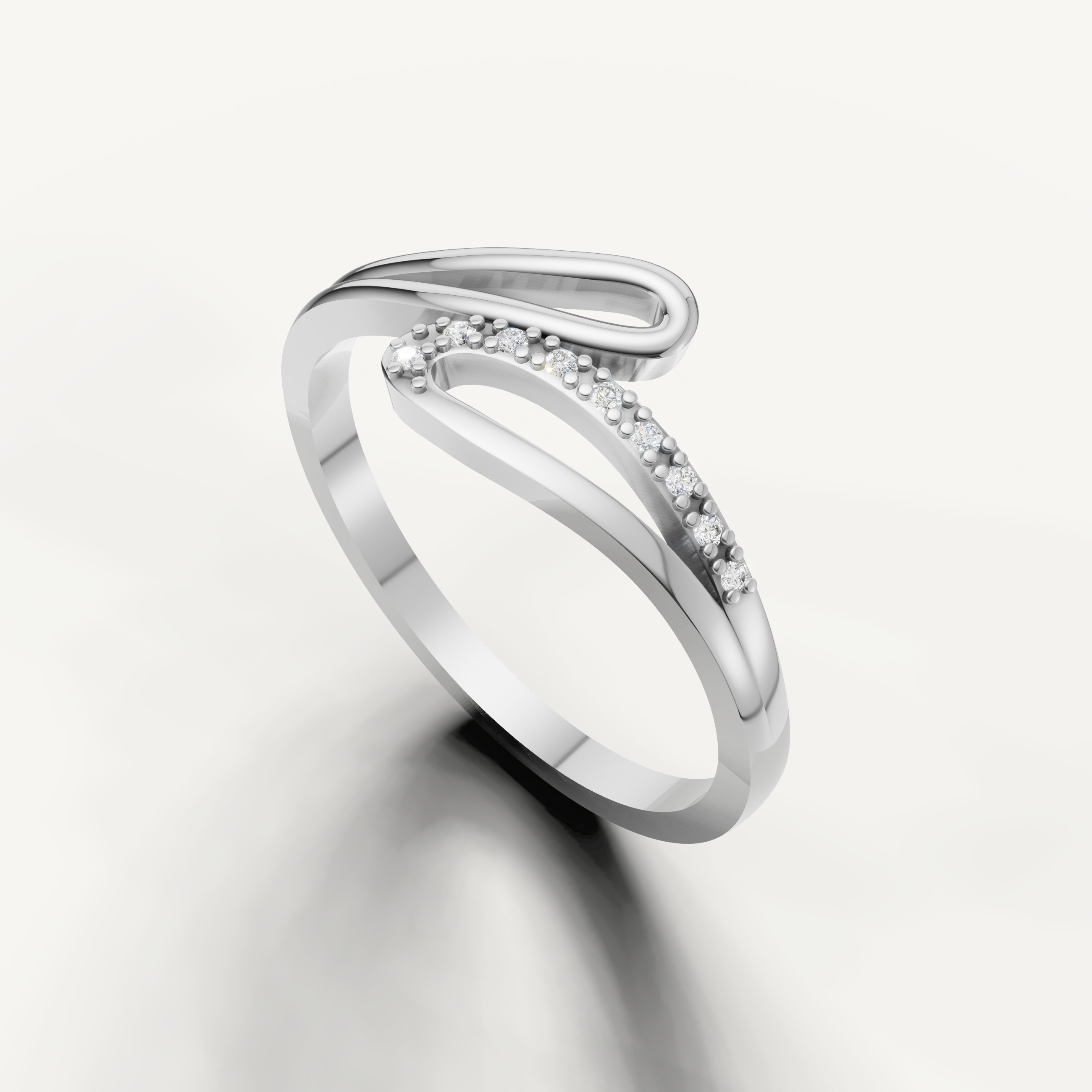 Luxury white gold wedding band featuring open flowing diamond detailing from Raul Diamonds
