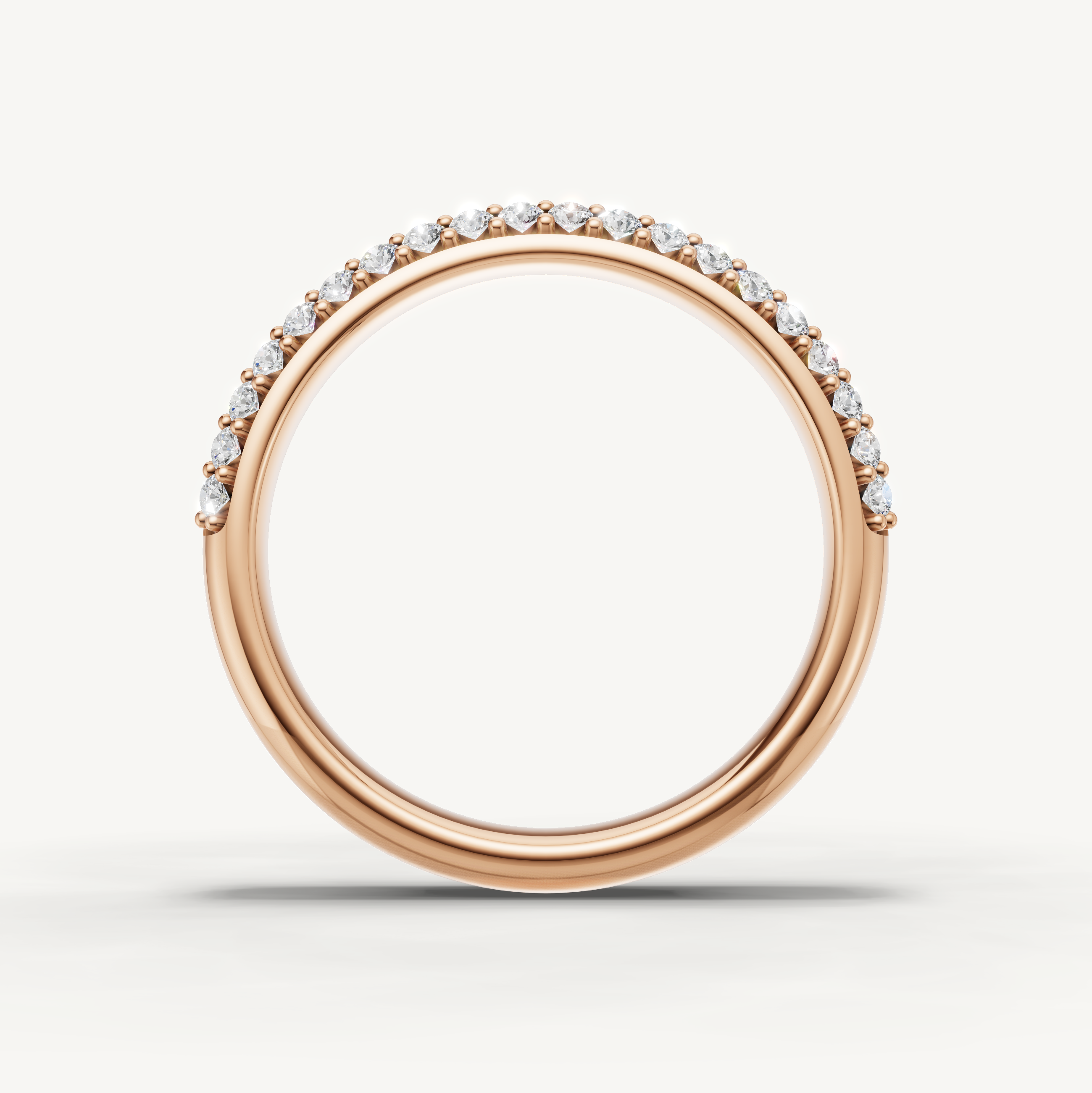 Stackable round diamond wedding band crafted in rose gold by Raul Diamonds