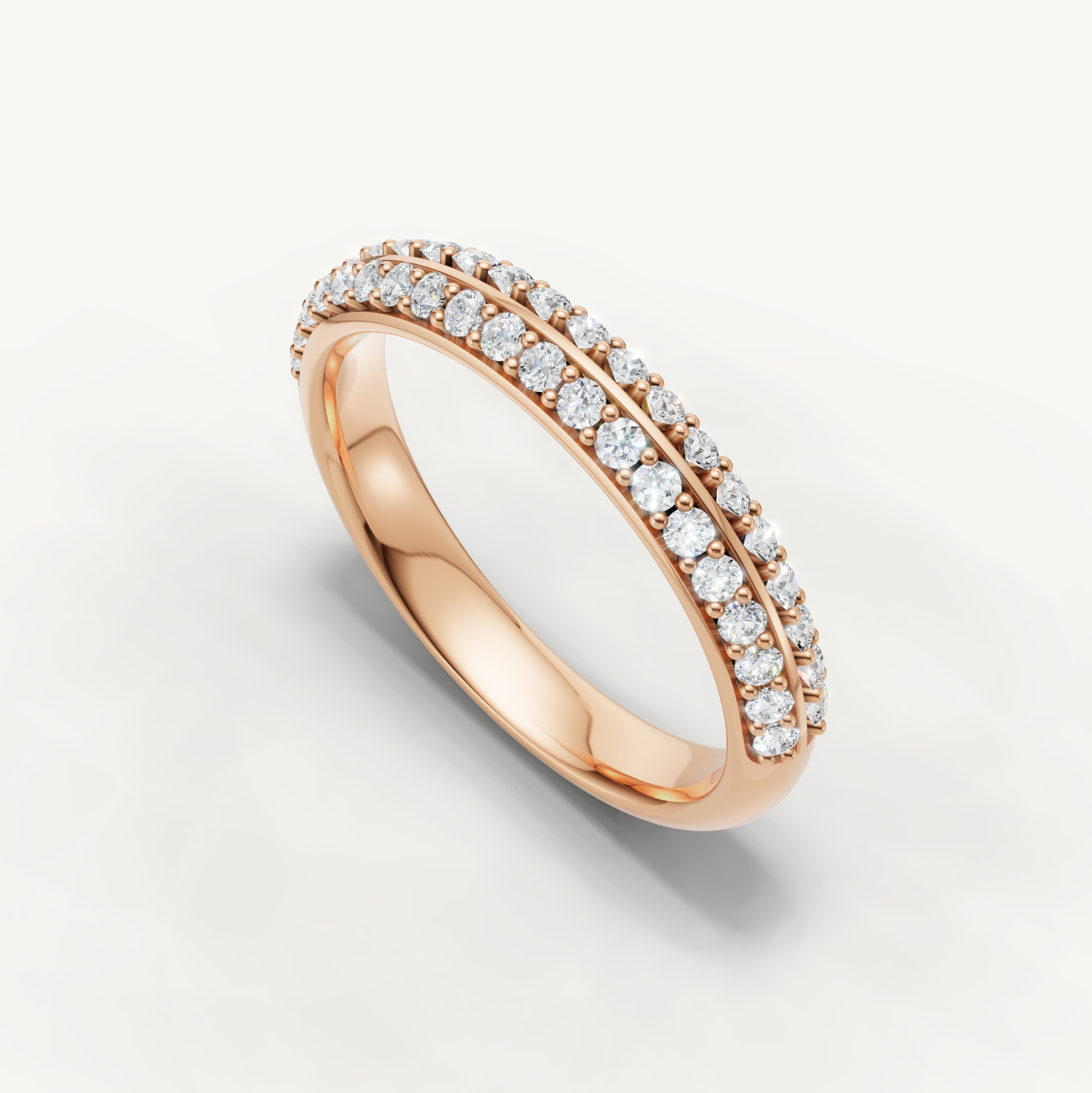 Luxury pavé diamond anniversary band in 14K rose gold by Raul Diamonds