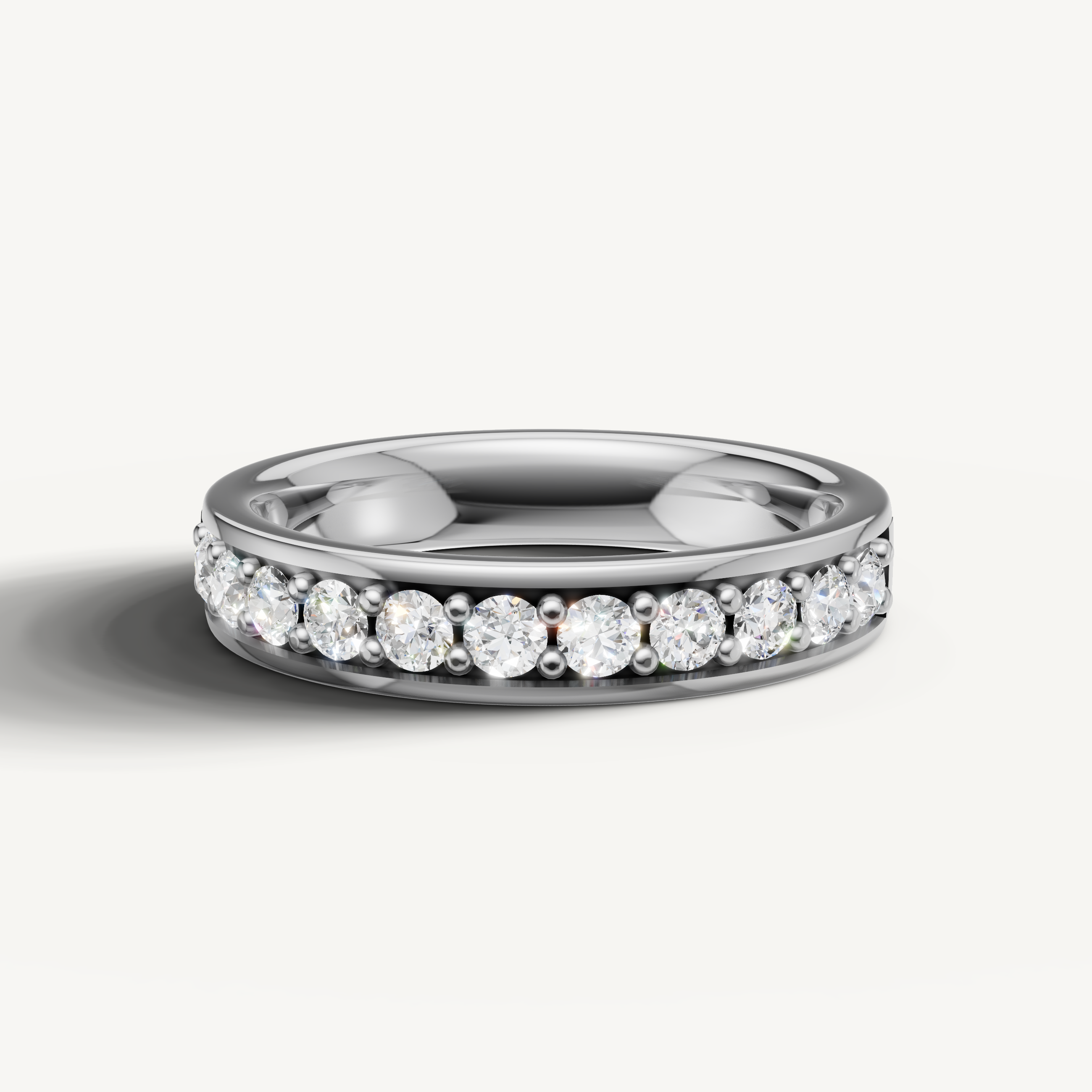 Raul Diamonds white gold diamond wedding band with round brilliant channel set diamonds