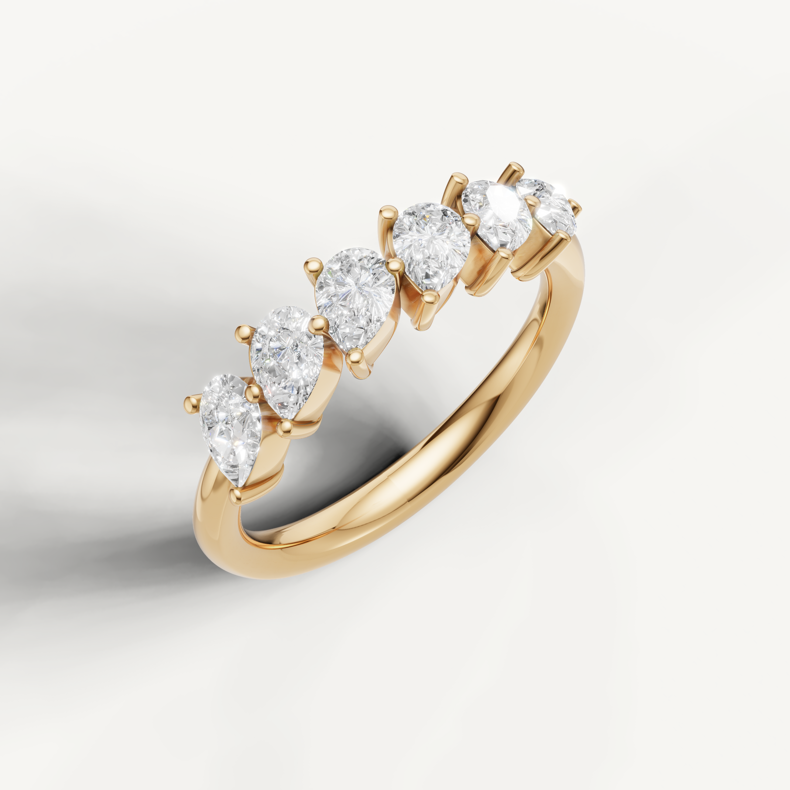 Luxury yellow gold pear shaped diamond anniversary wedding band by Raul Diamonds