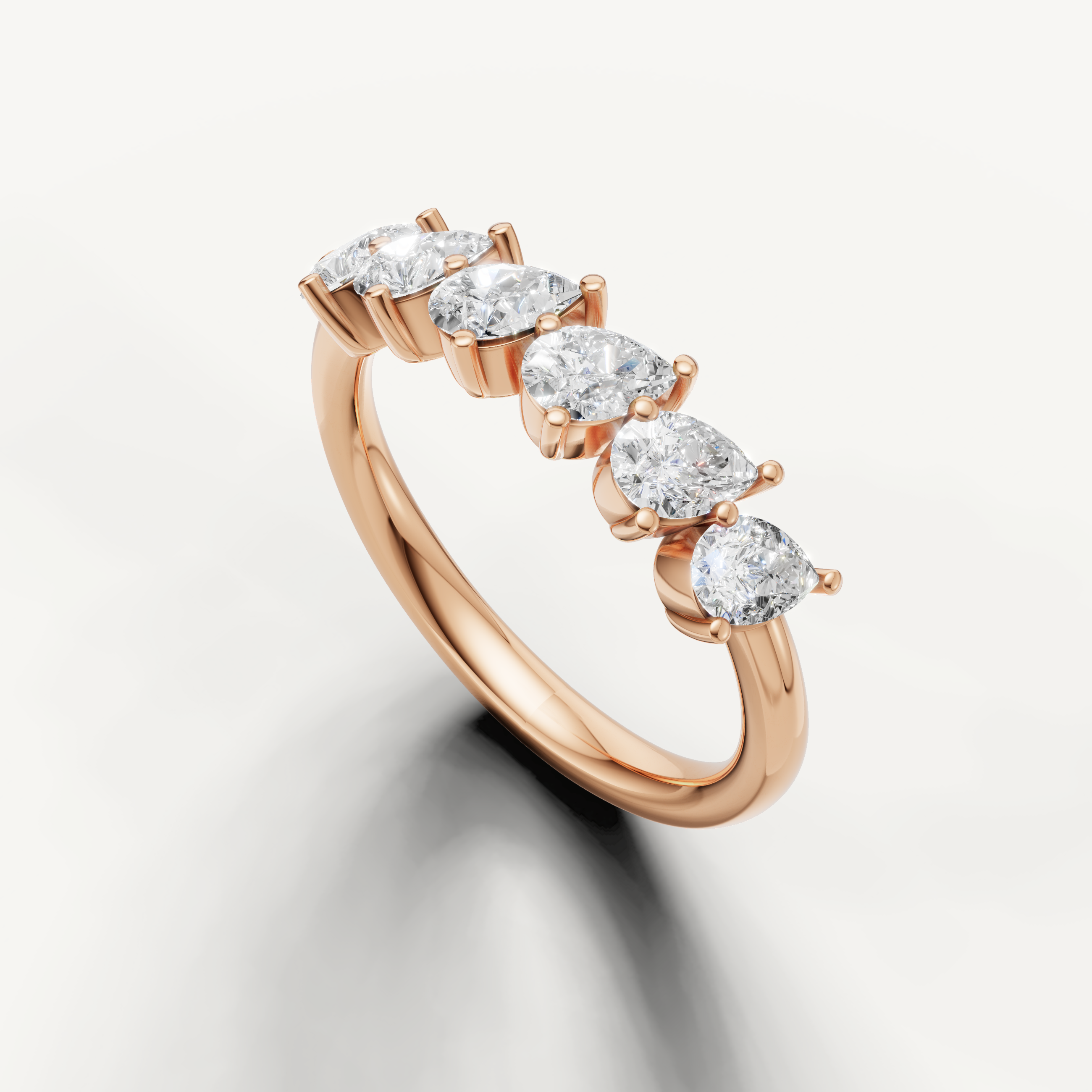Luxury rose gold wedding band with pear cut diamonds for women Raul Diamonds