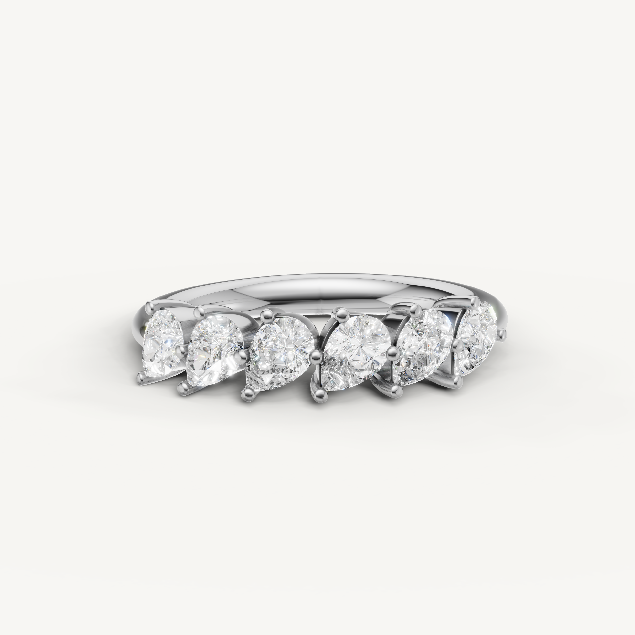 Raul Diamonds white gold pear cut diamond wedding band with elegant shared prong setting