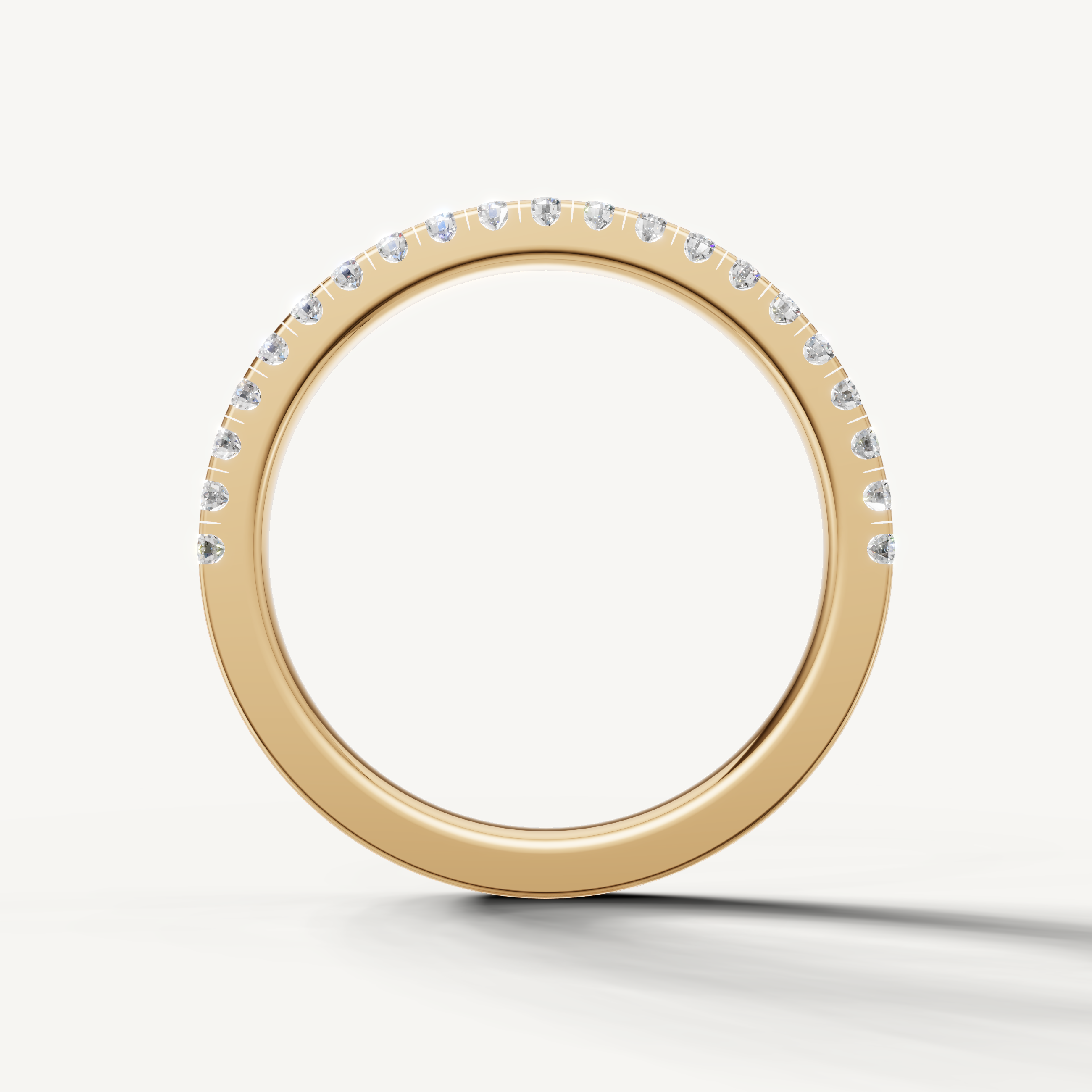 Classic yellow gold thin diamond wedding band with sparkling pave setting