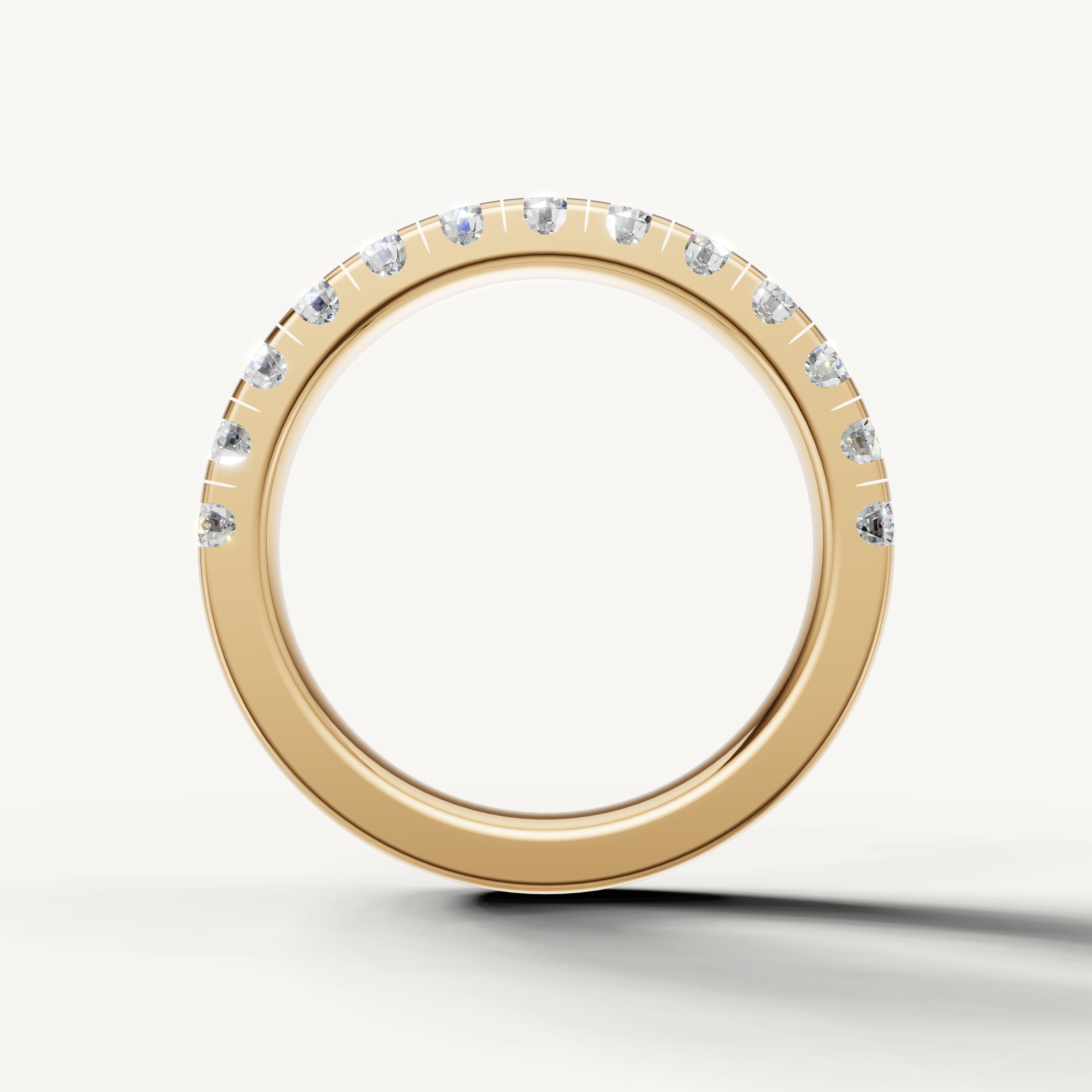 Classic yellow gold diamond wedding ring with continuous diamond row from Raul Diamonds