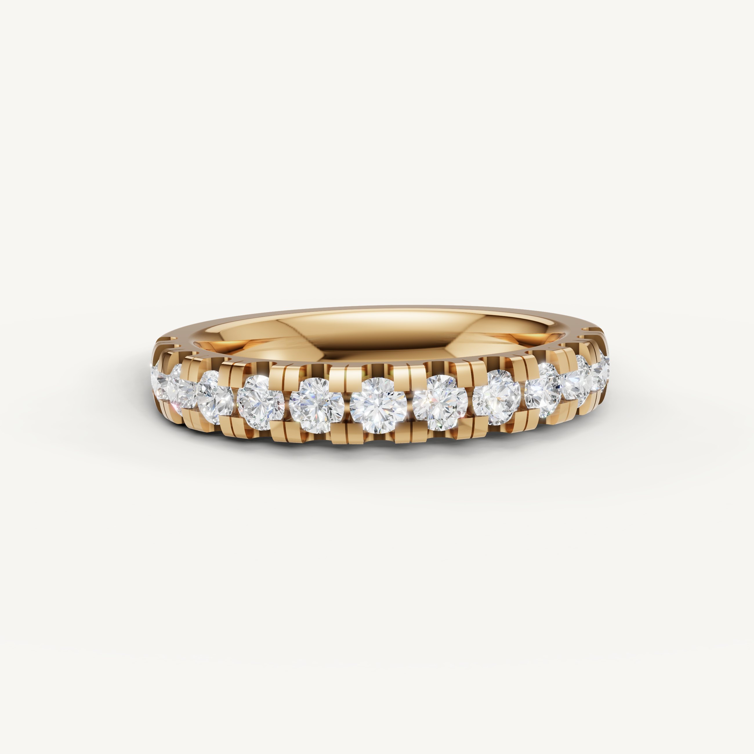 Raul Diamonds yellow gold round diamond eternity wedding band with shared prong setting