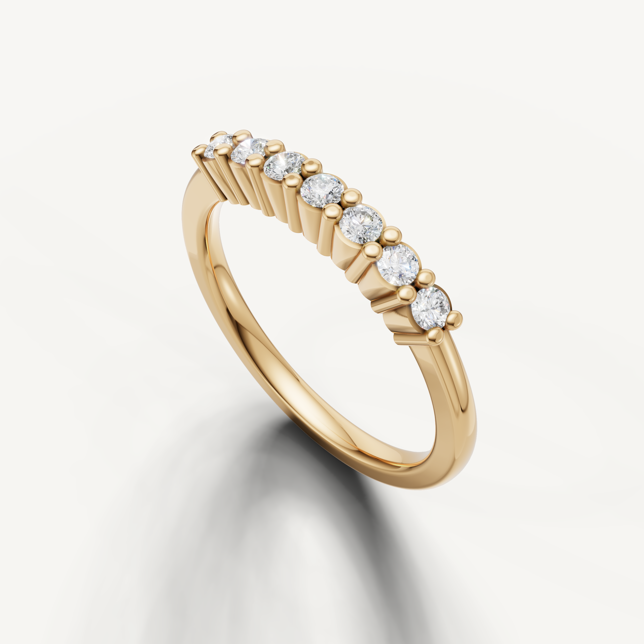 Luxury yellow gold round diamond wedding band with classic shared prong setting