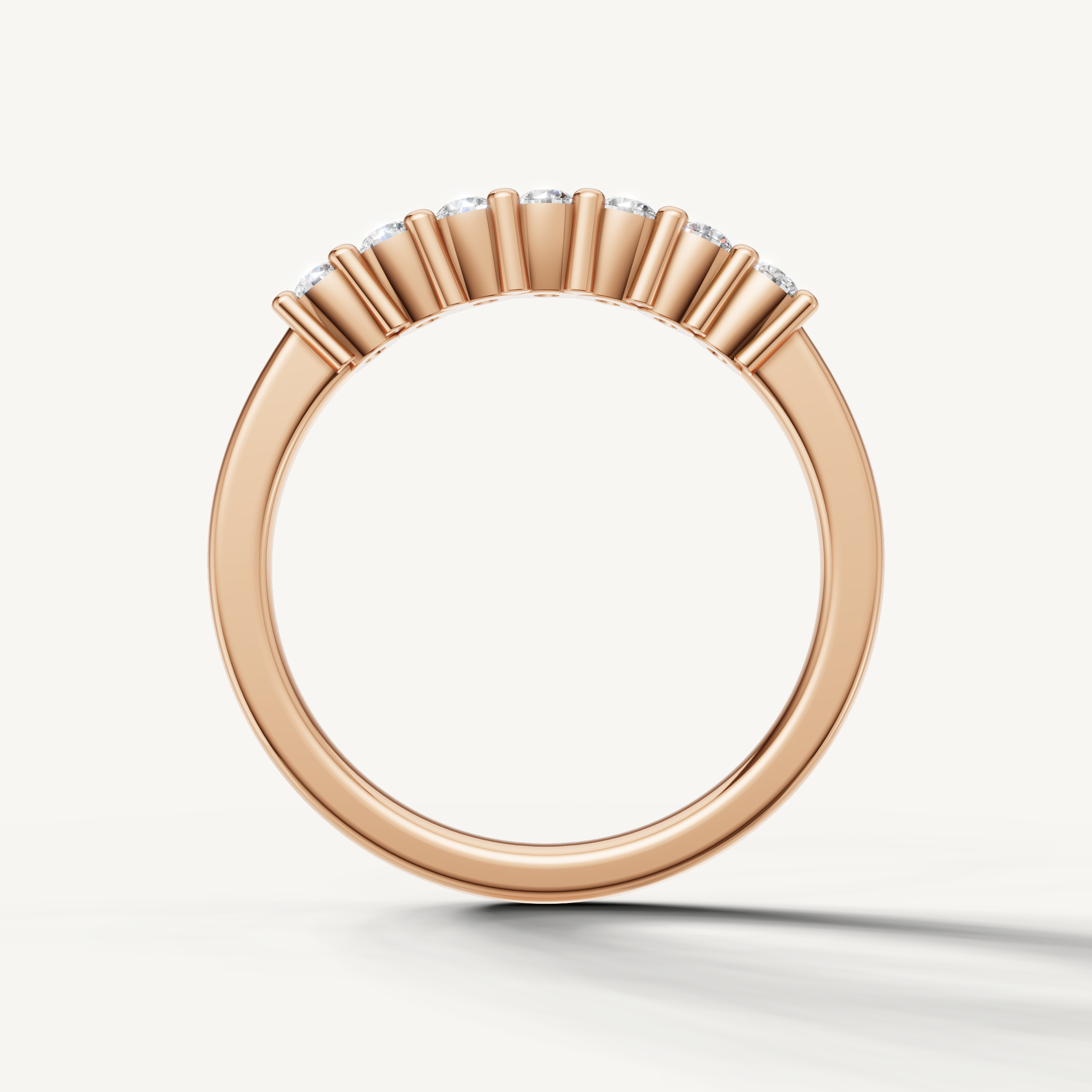 Luxury rose gold shared prong diamond wedding ring with brilliant diamonds
