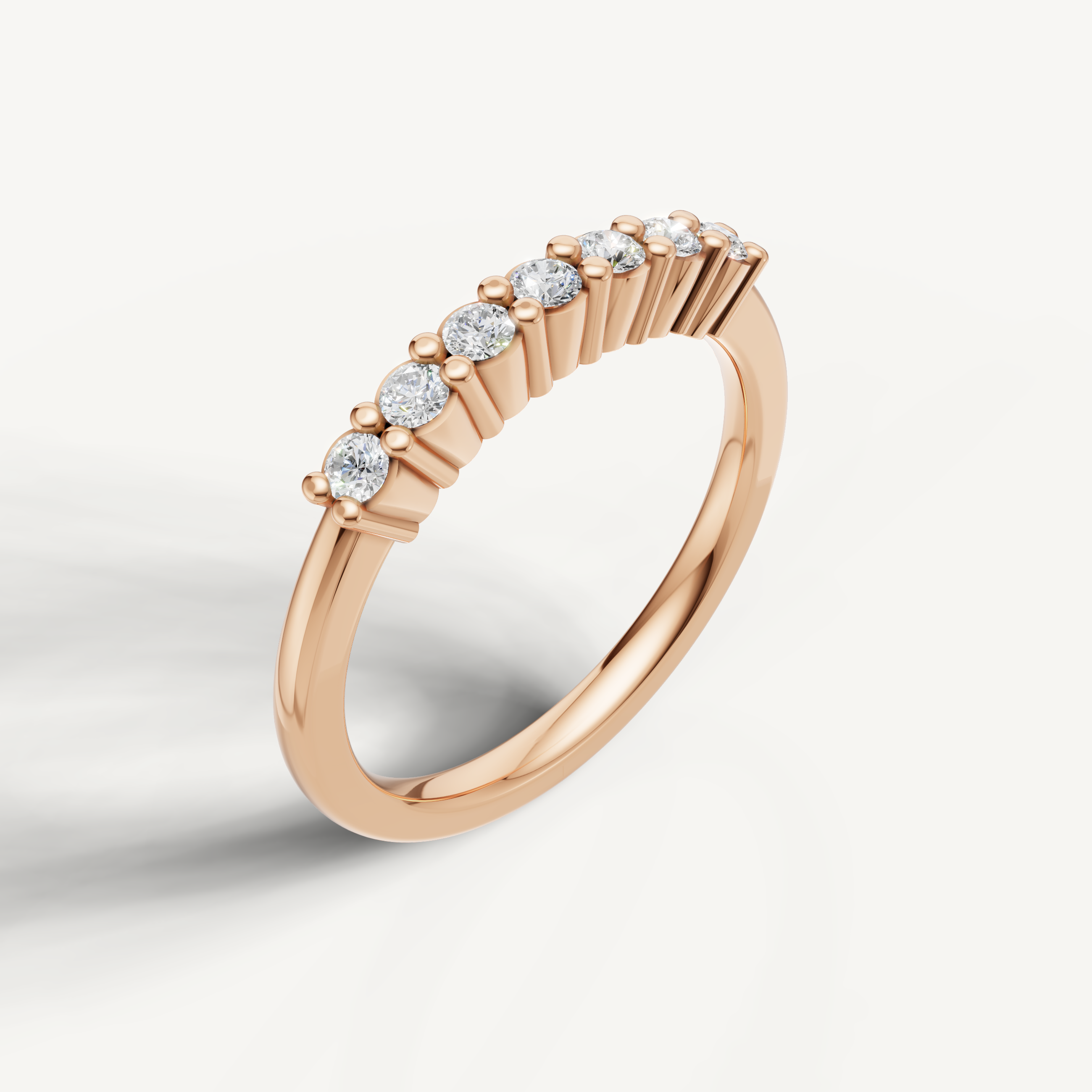 Romantic rose gold diamond anniversary ring with sparkling round diamonds by Raul Diamonds