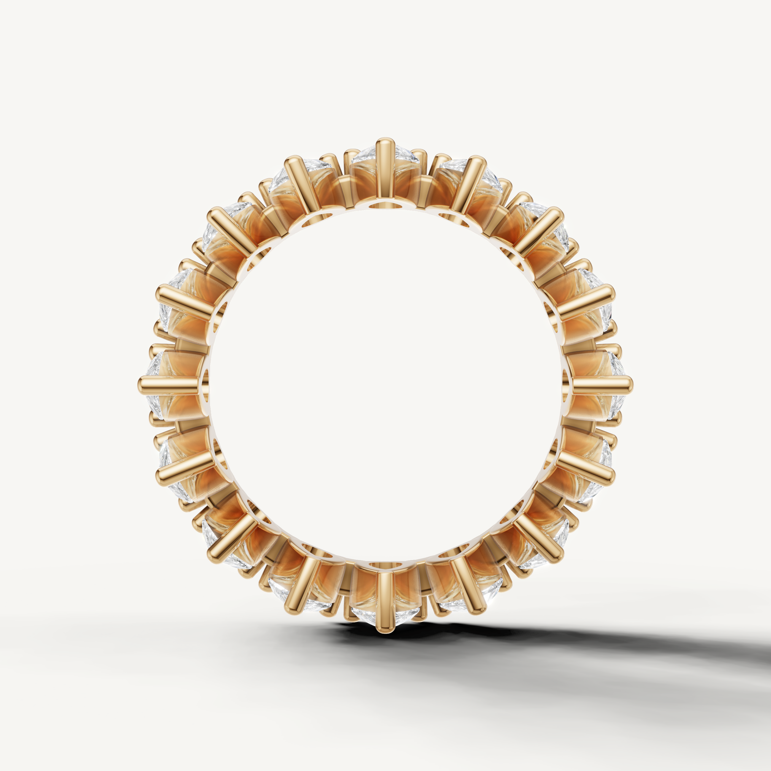 Timeless yellow gold pear shaped diamond eternity band crafted by Raul Diamonds