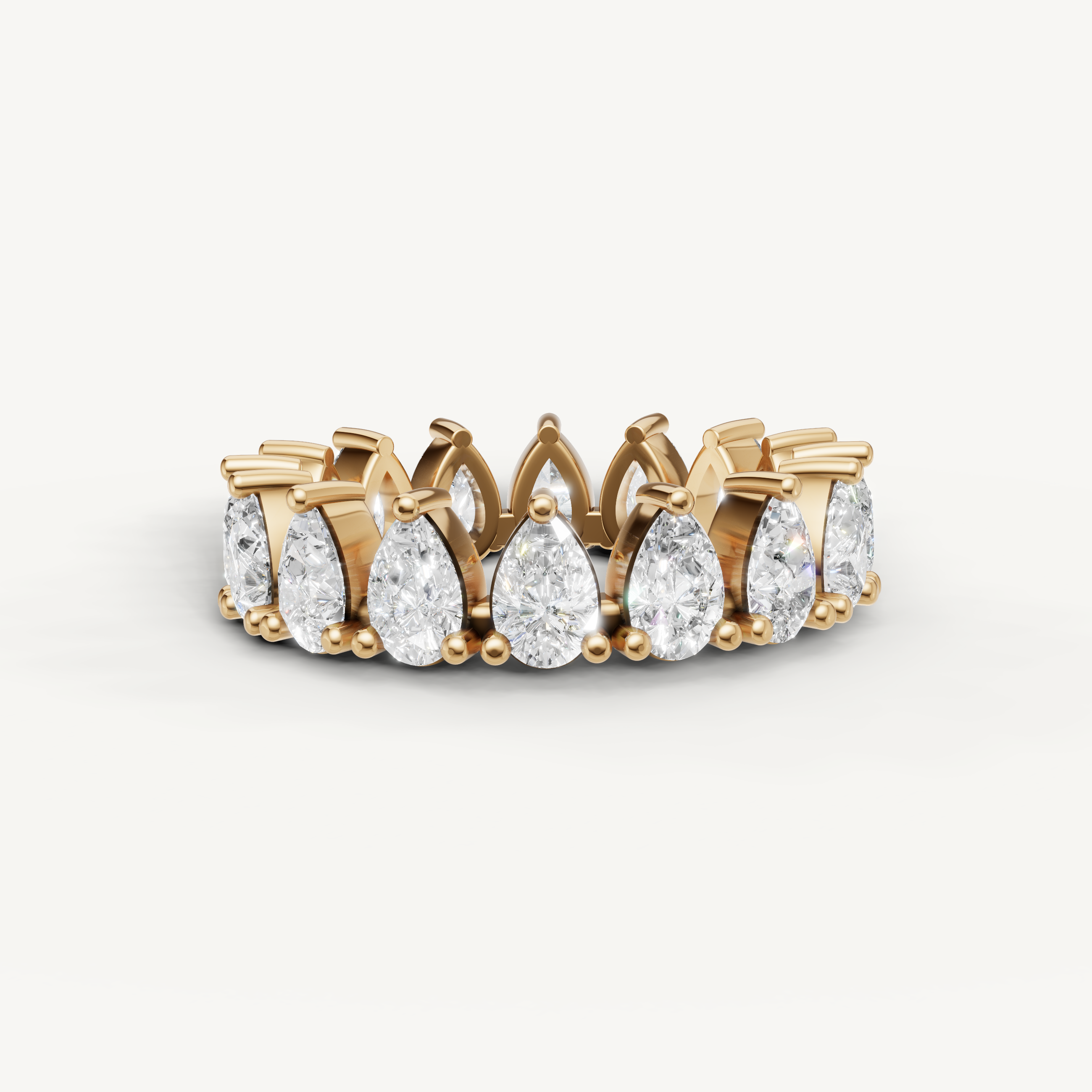 Raul Diamonds yellow gold pear shaped diamond eternity wedding band with luxury prong setting