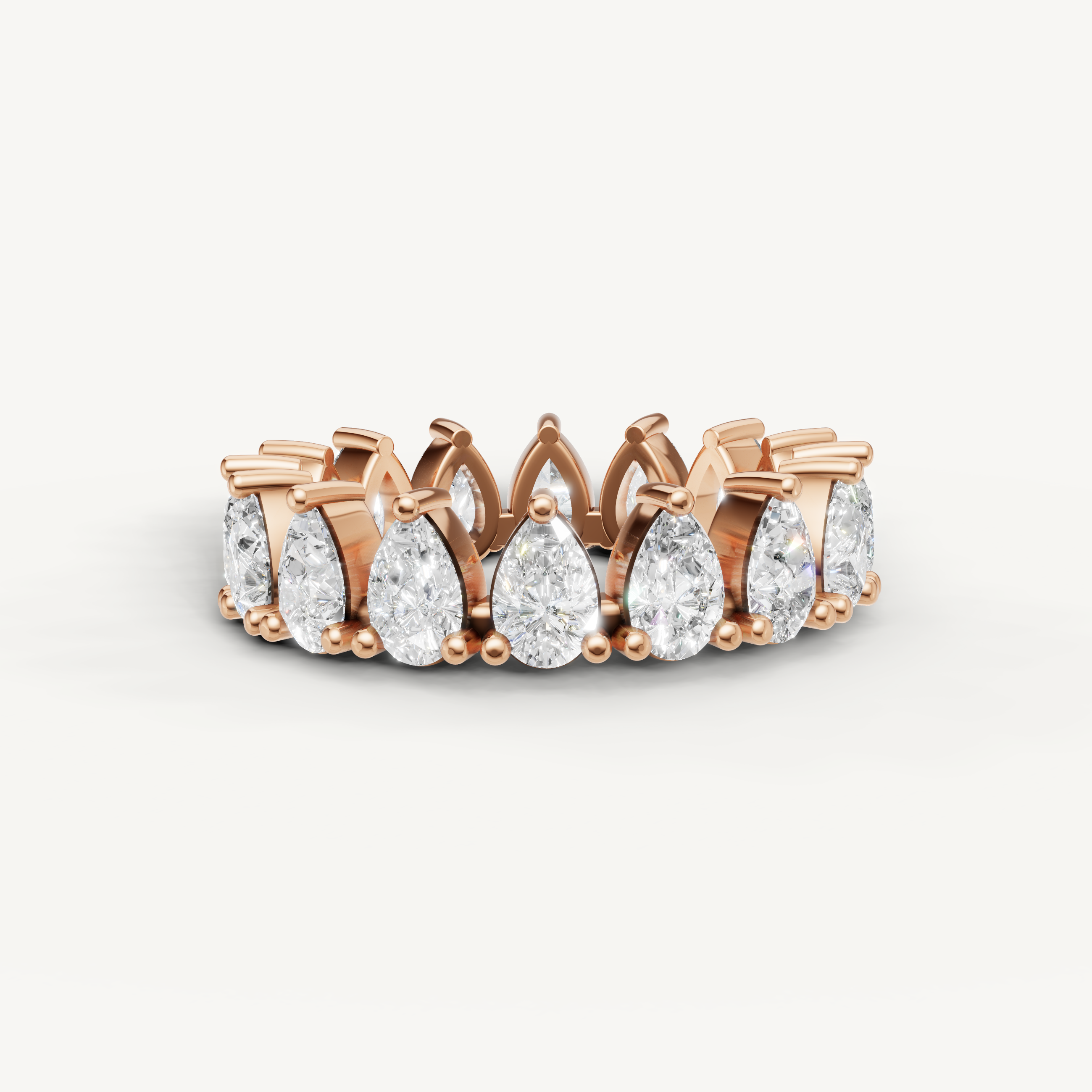 Raul Diamonds rose gold pear shaped diamond eternity wedding band with elegant design