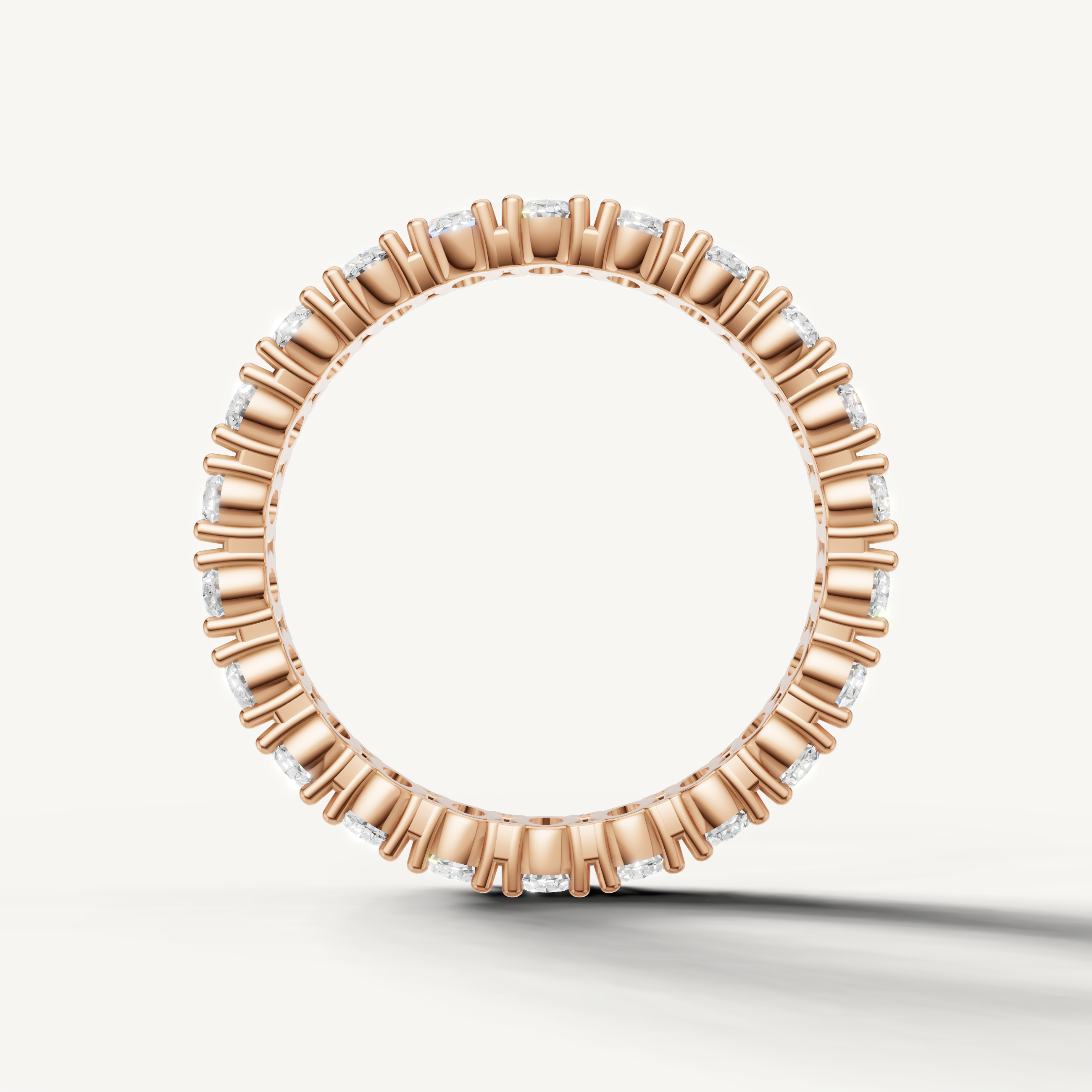 Elegant rose gold oval diamond anniversary band with brilliant sparkle