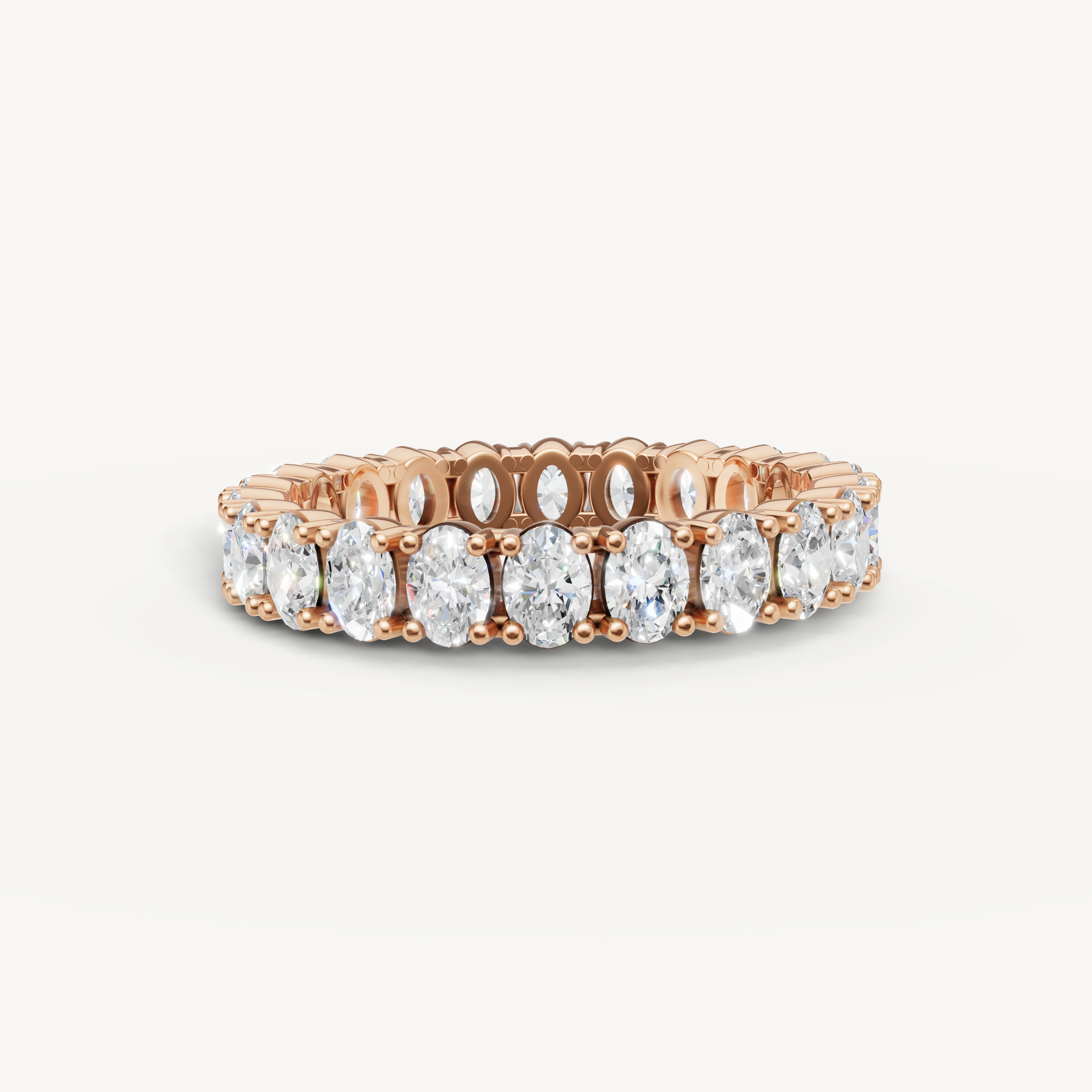Raul Diamonds rose gold oval diamond eternity wedding band with luxury prong design